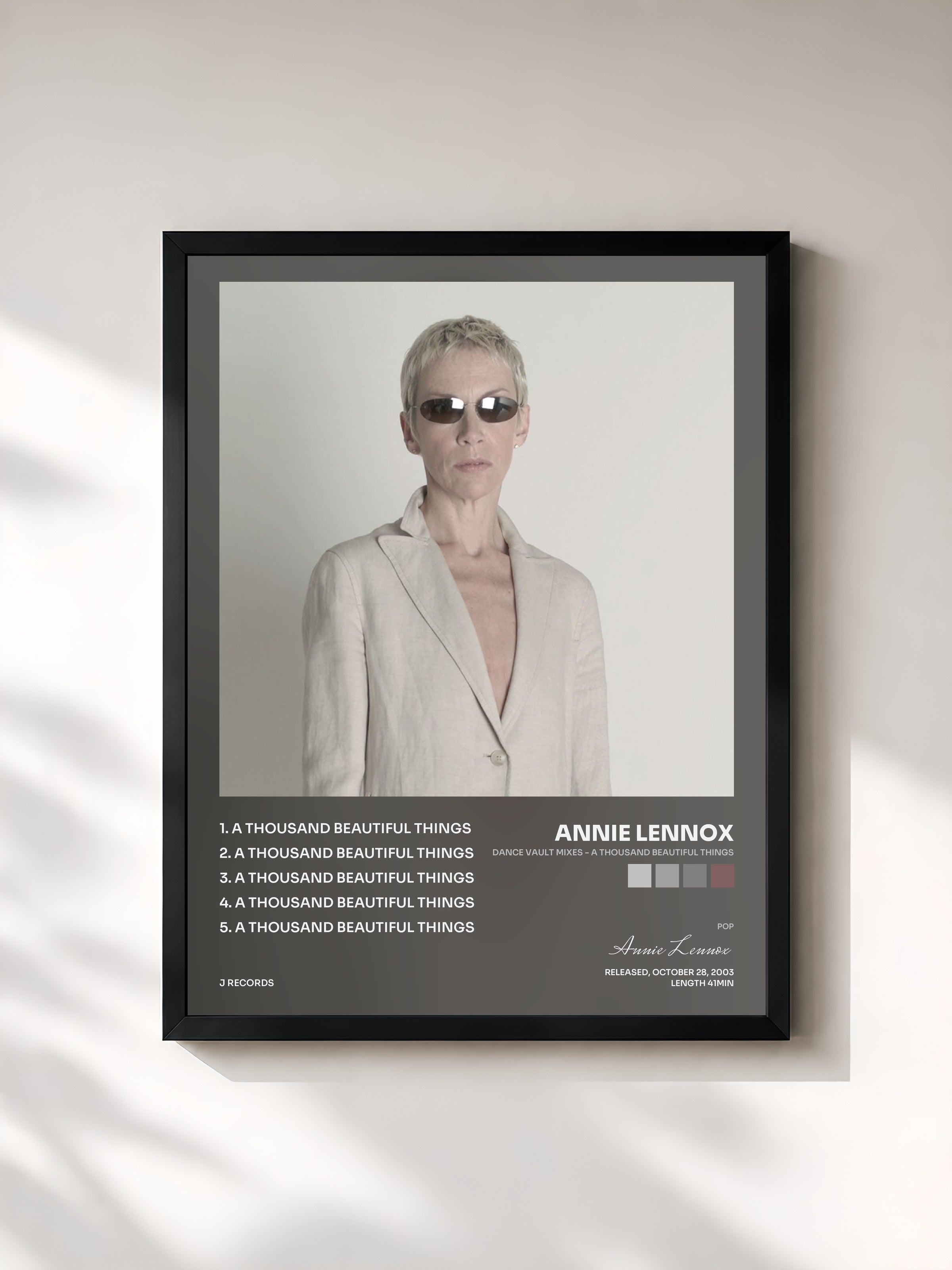 #noir Tableau de l'album Dance Vault Mixes - A Thousand Beautiful Things de Annie Lennox, cadre noir, imprimé et encadré en France