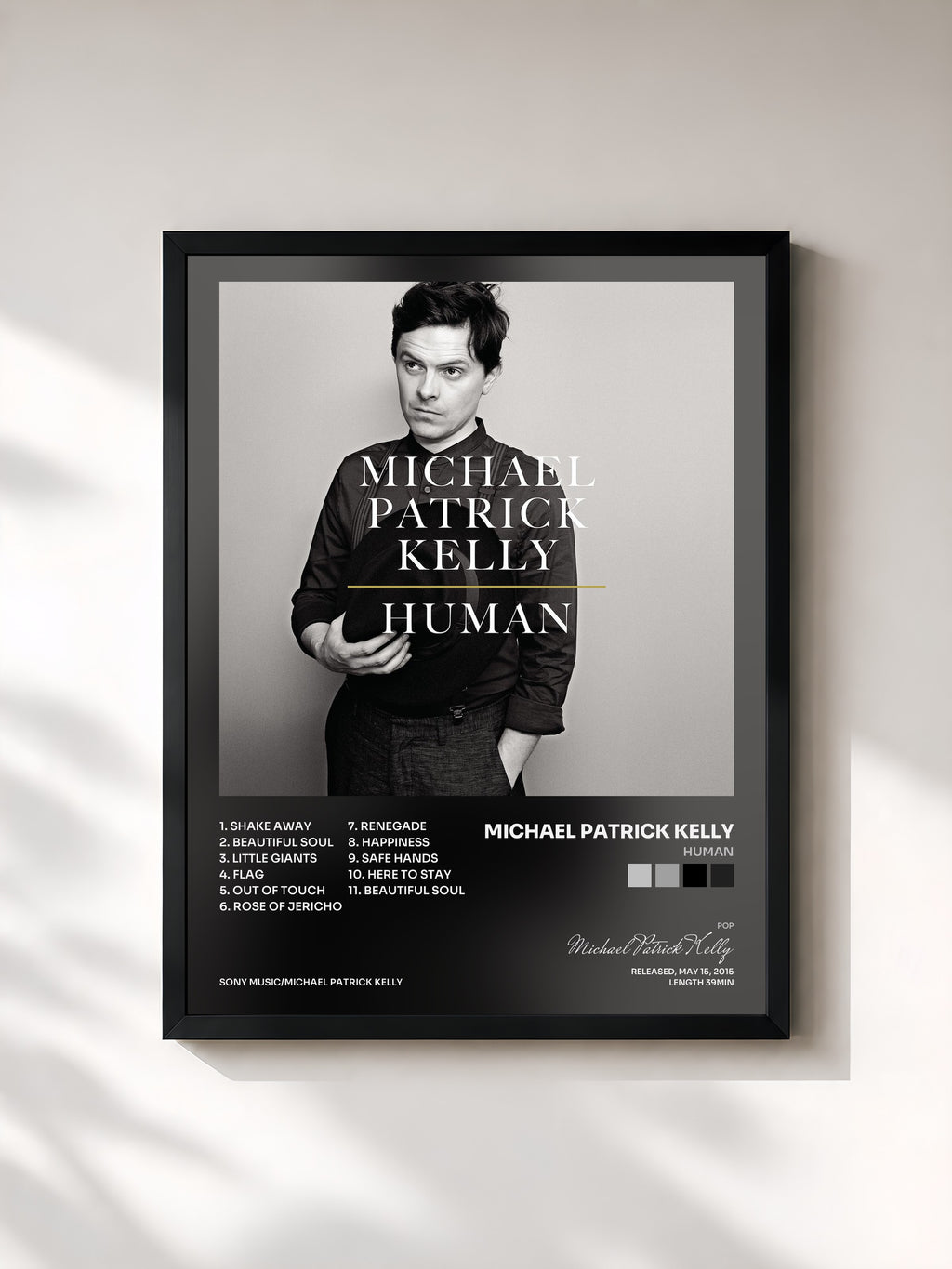 #noir Tableau de l'album Human de Michael Patrick Kelly, cadre noir, imprimé et encadré en France