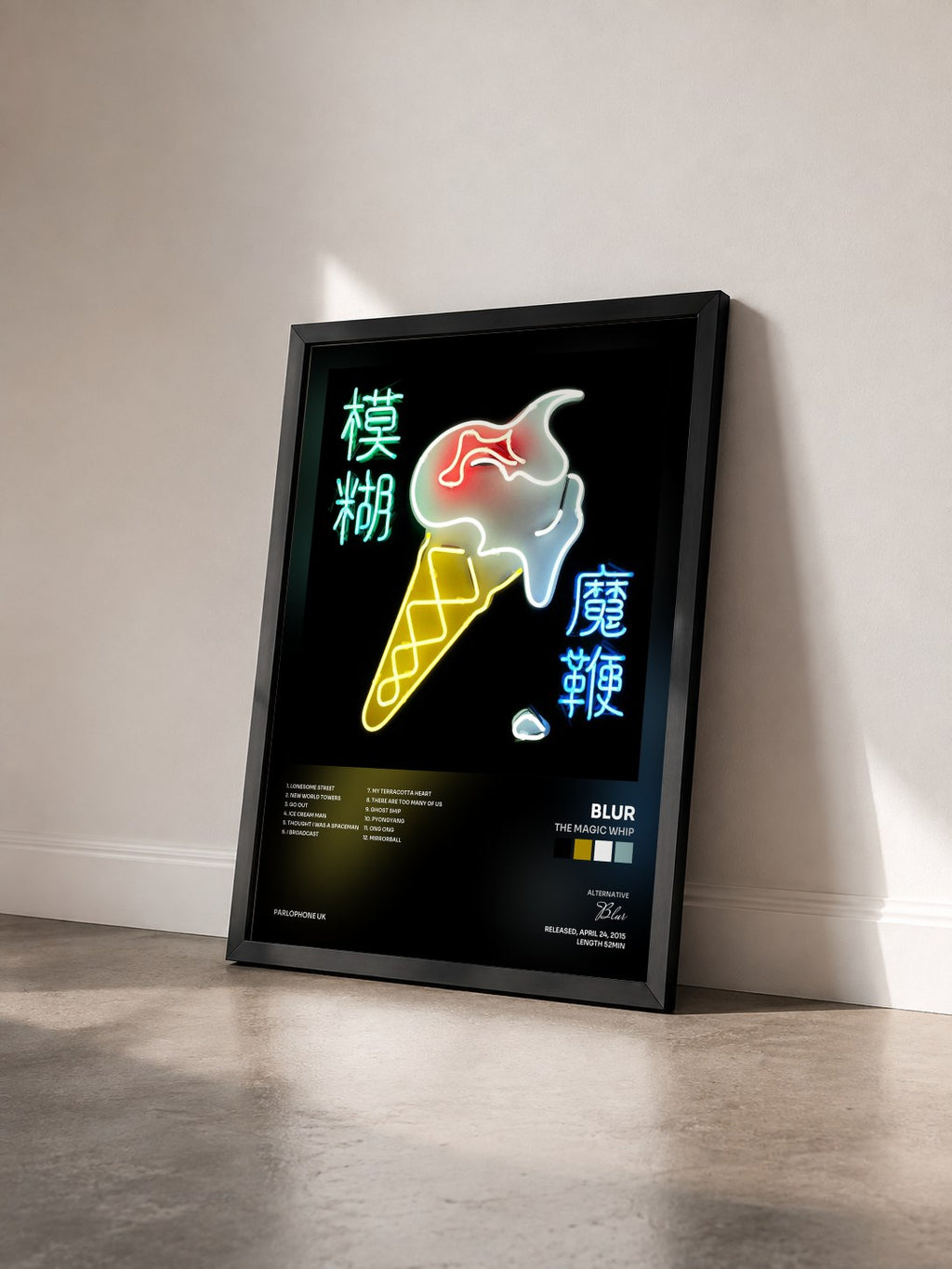 #noir Tableau de l'album The Magic Whip de Blur vu de trois quarts, cadre noir