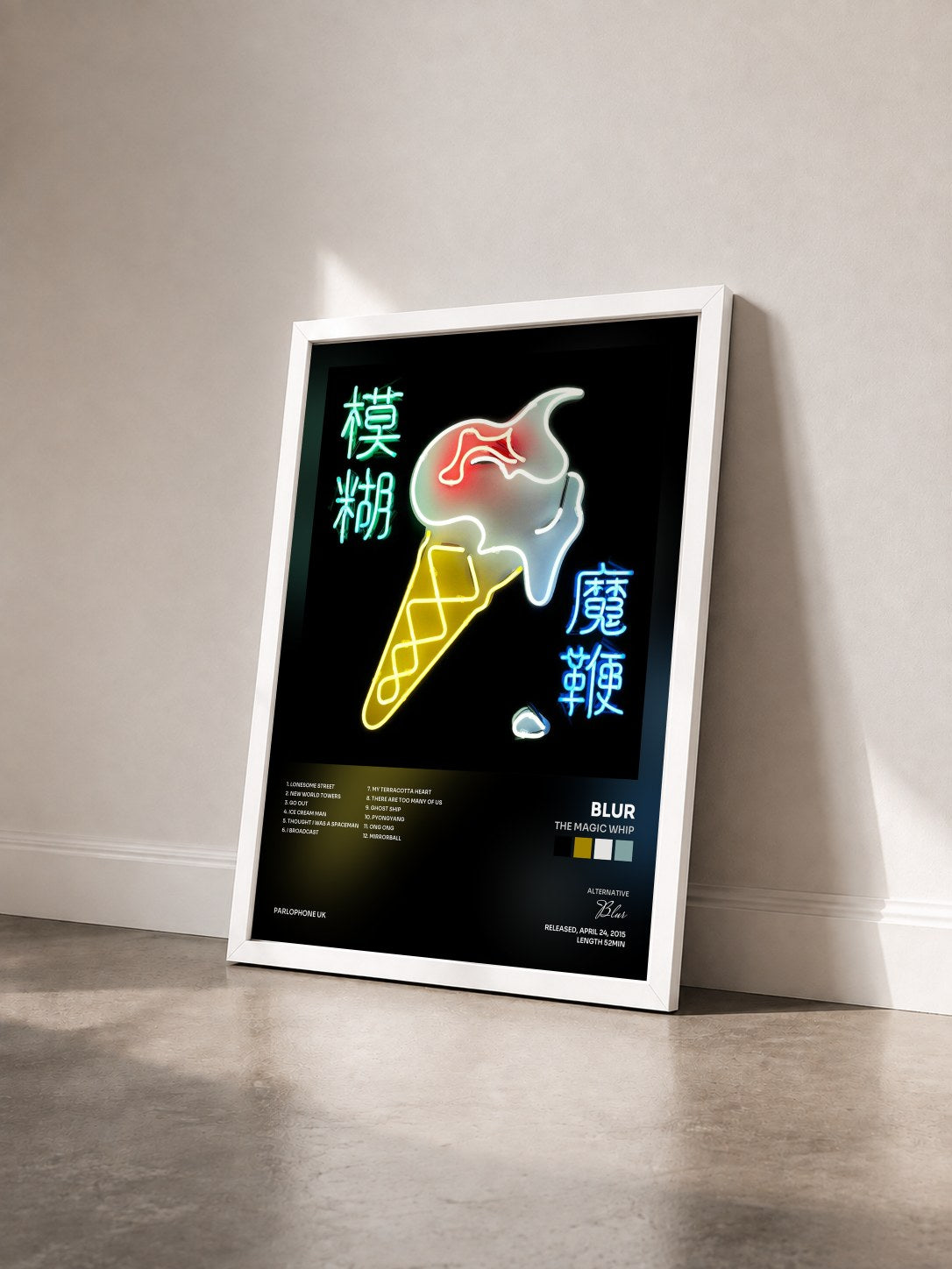 #blanc Tableau de l'album The Magic Whip de Blur vu de trois quarts, cadre blanc