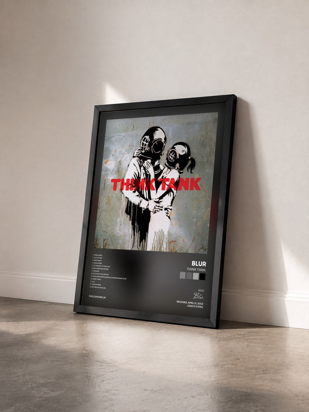 #noir Tableau de l'album Think Tank de Blur vu de trois quarts, cadre noir