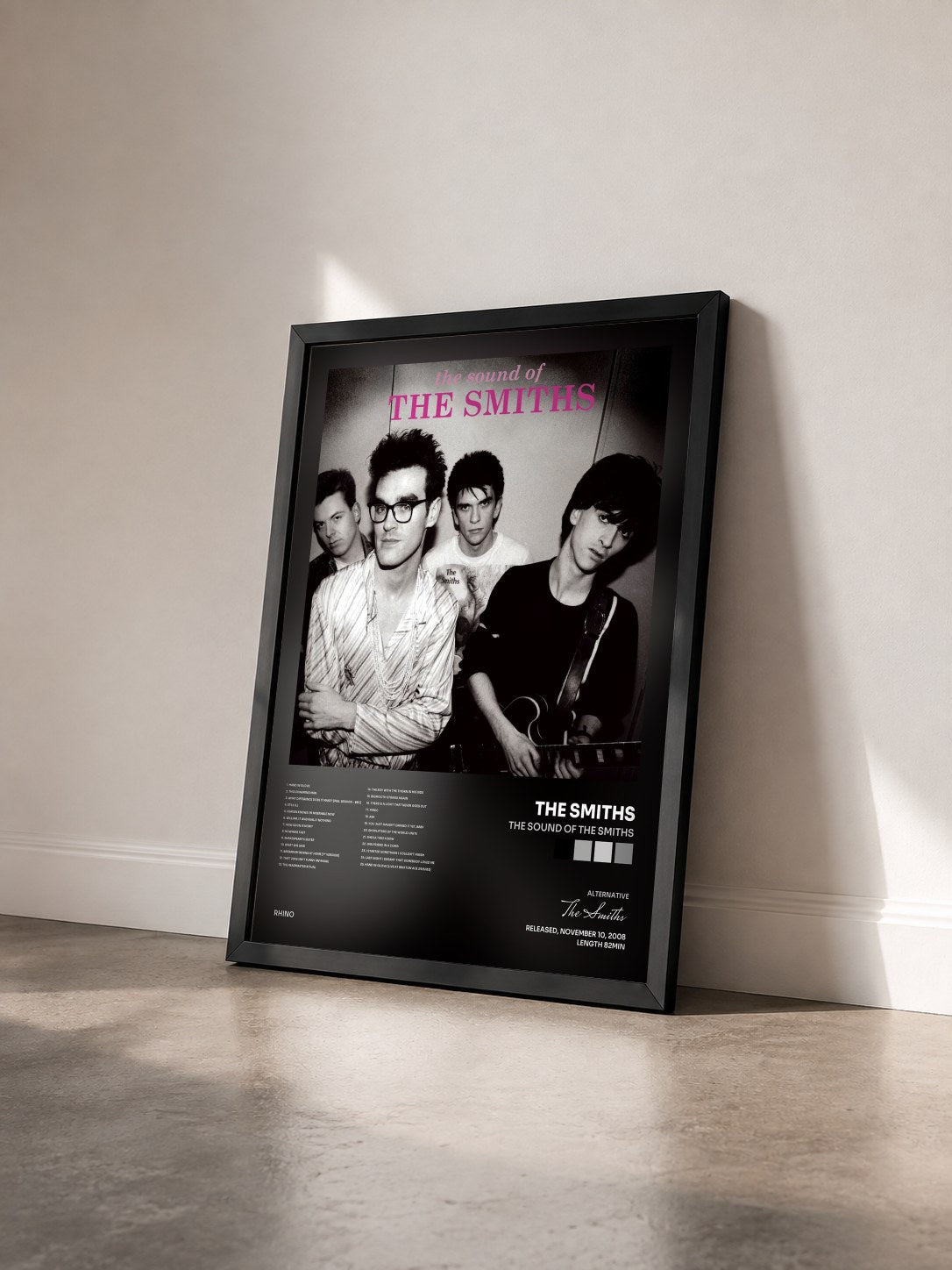 #noir The Sound Of The Smiths by The Smiths as a framed art print seen at an angle, black frame