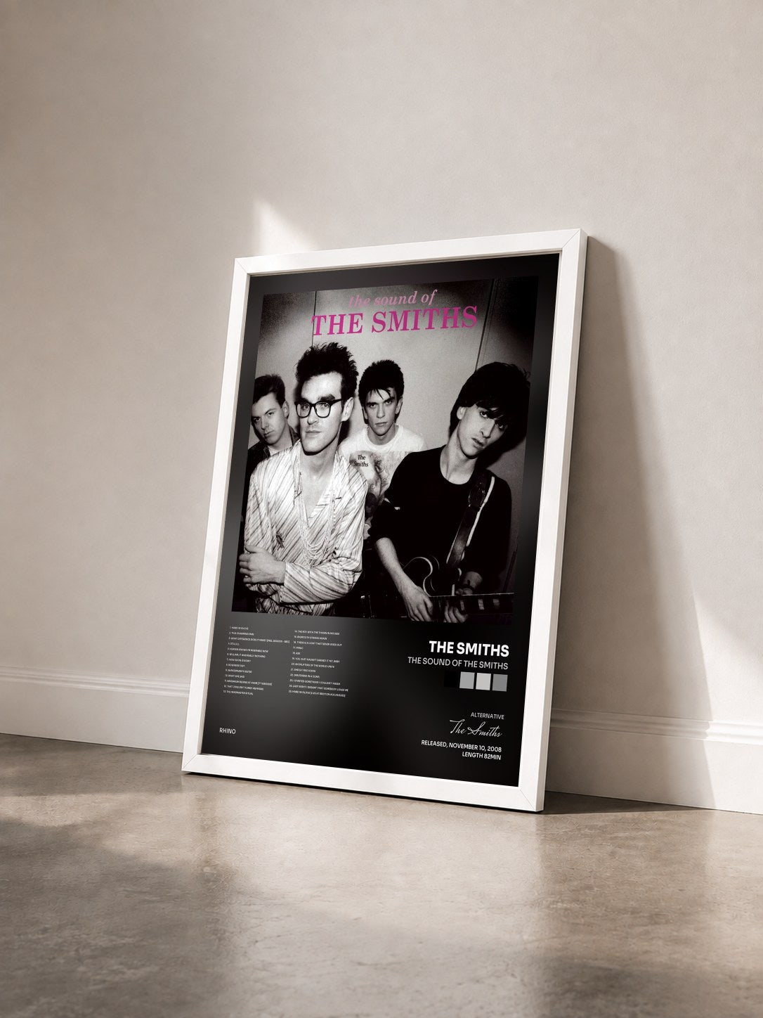 #blanc The Sound Of The Smiths by The Smiths as a framed art print seen at an angle, white frame