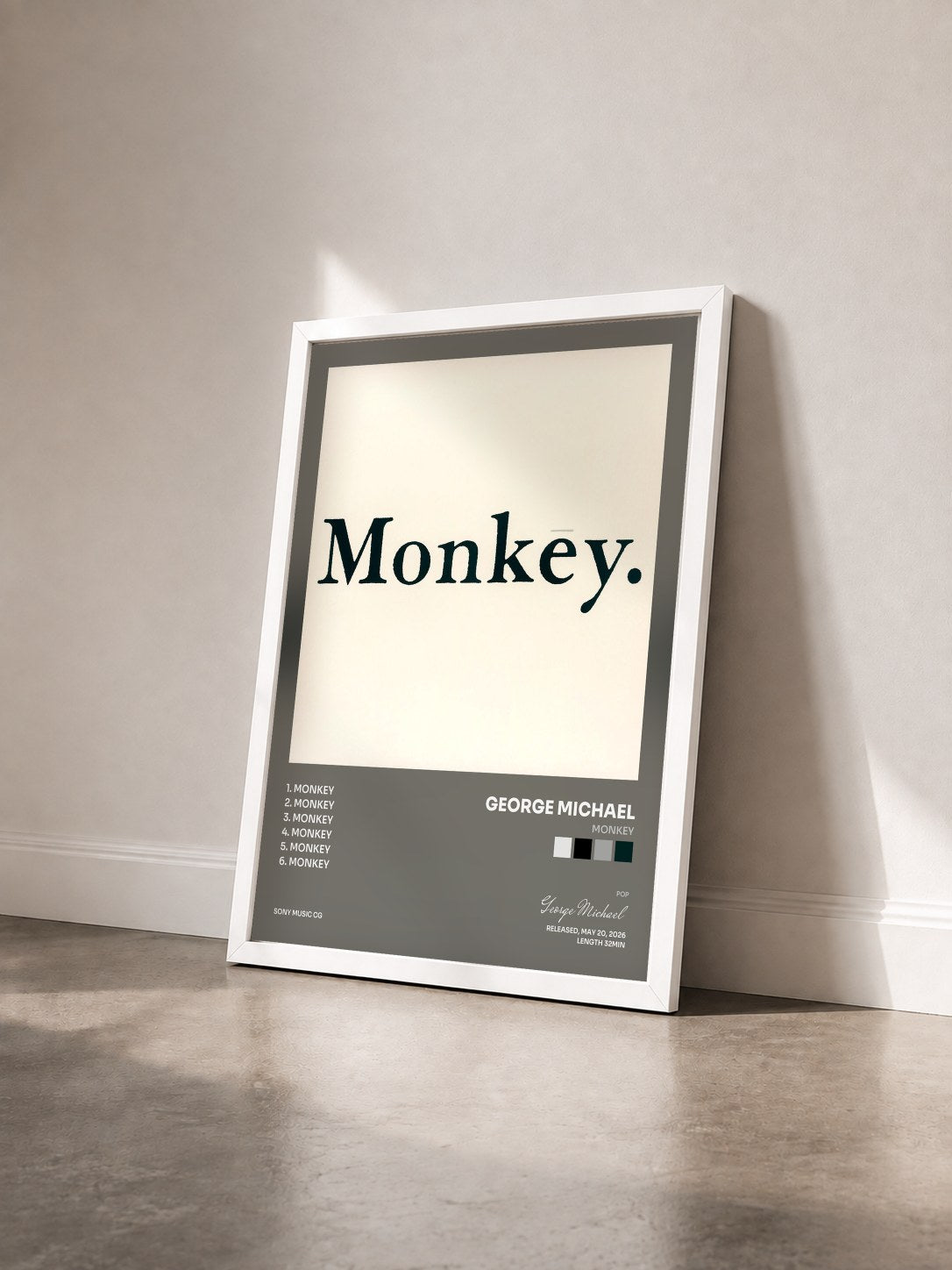 #blanc Tableau de l'album Monkey de George Michael vu de trois quarts, cadre blanc