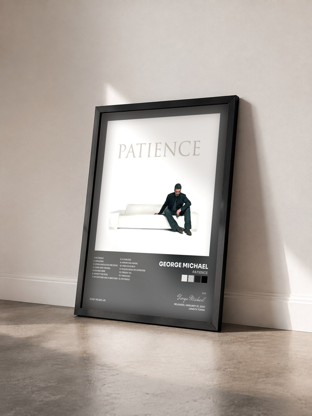 #noir Tableau de l'album Patience de George Michael vu de trois quarts, cadre noir