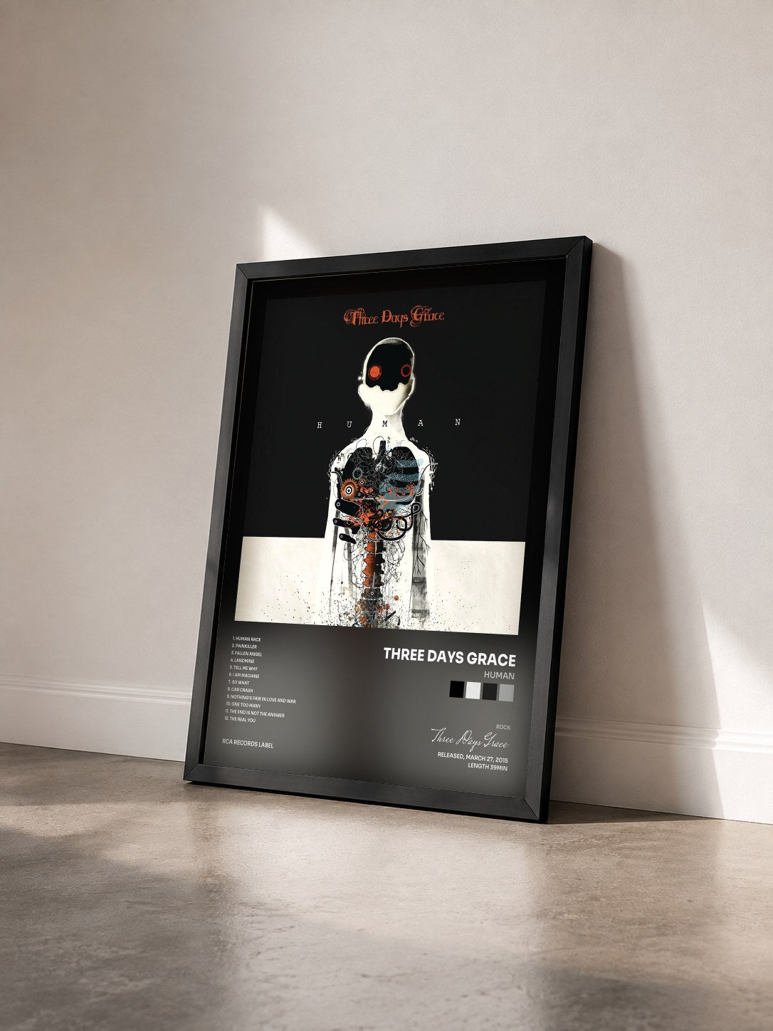 #noir Tableau de l'album Human de Three Days Grace vu de trois quarts, cadre noir
