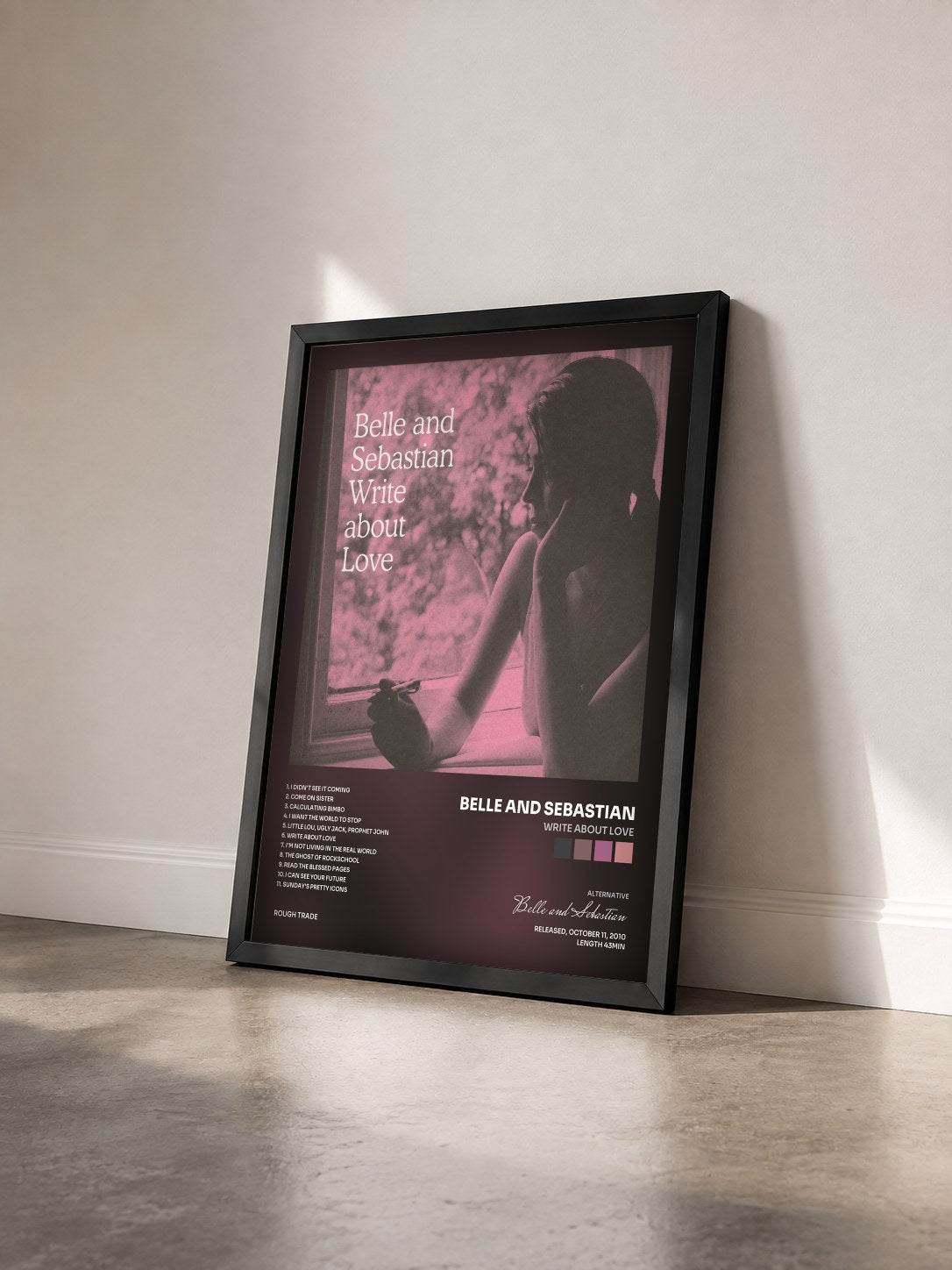 #noir Tableau de l'album Write About Love de Belle and Sebastian vu de trois quarts, cadre noir