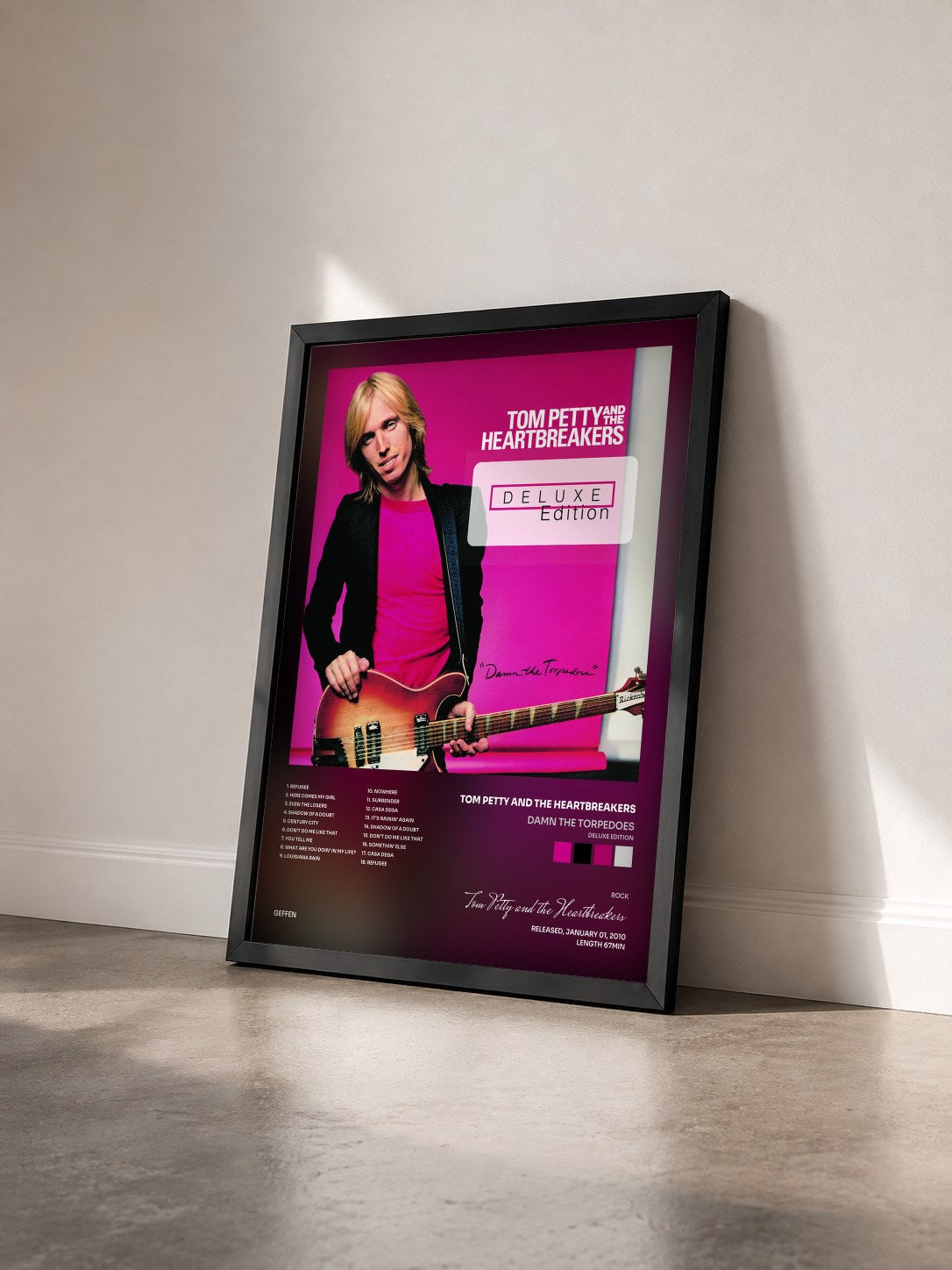 #noir Tableau de l'album Damn The Torpedoes (Deluxe Edition) de Tom Petty and the Heartbreakers vu de trois quarts, cadre noir