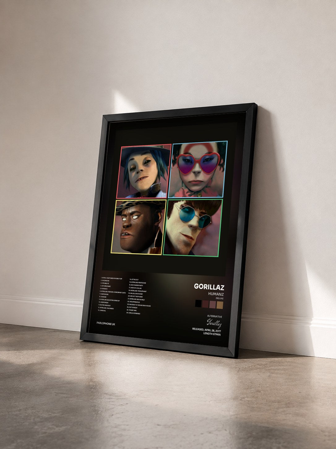 #noir Humanz (Deluxe) by Gorillaz as a framed art print seen at an angle, black frame