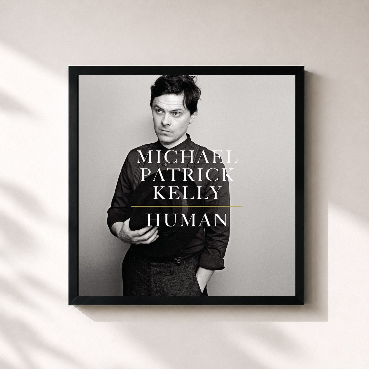 #noir Tableau carré de l'album Human de Michael Patrick Kelly, cadre noir 32x32 cm
