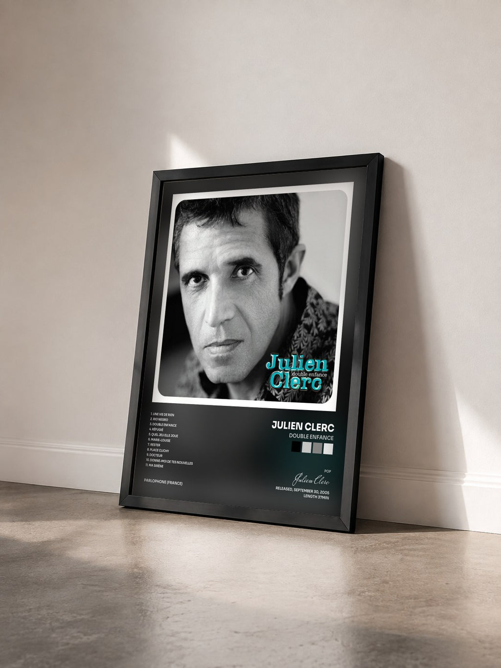 #noir Double enfance by Julien Clerc as a framed art print seen at an angle, black frame