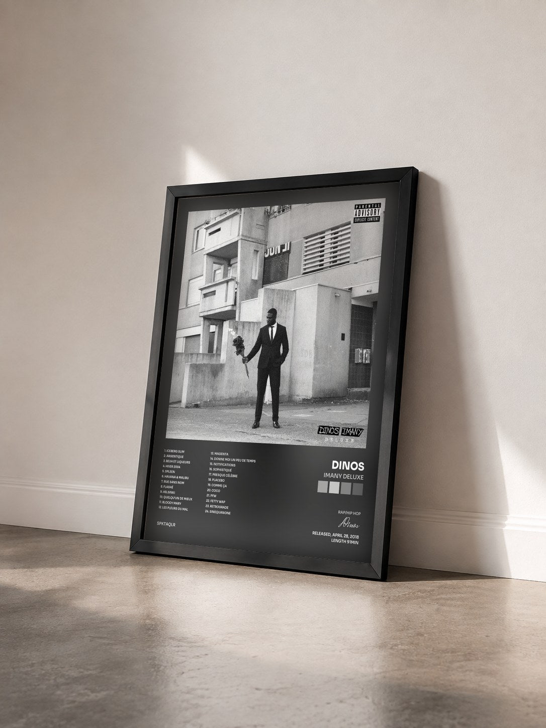 #noir Imany Deluxe by Dinos as a framed art print seen at an angle, black frame
