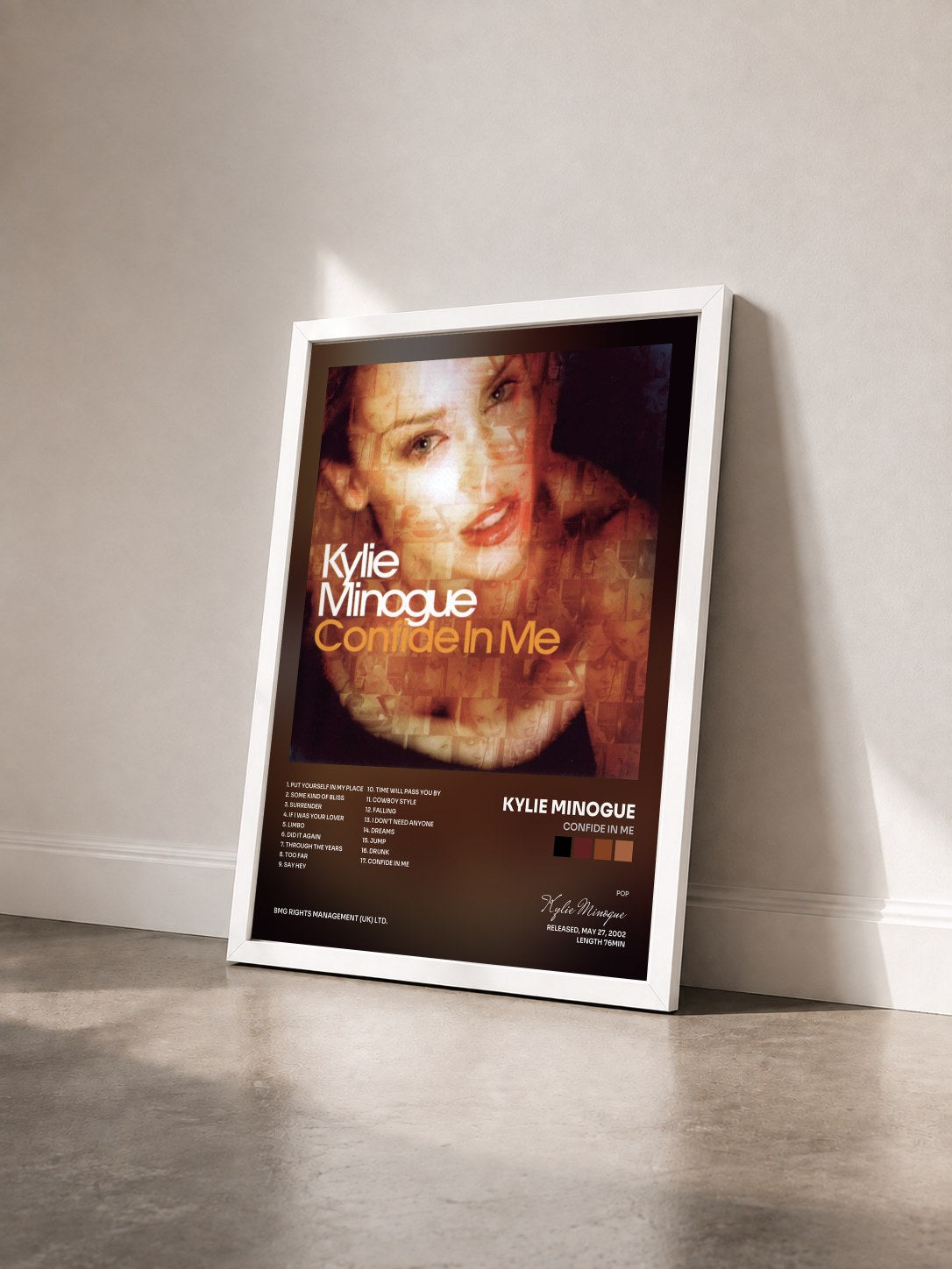#blanc Tableau de l'album Confide in Me de Kylie Minogue vu de trois quarts, cadre blanc