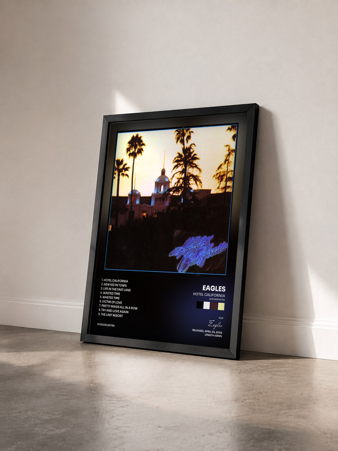 #noir Hotel California (2013 Remaster) by Eagles as a framed art print seen at an angle, black frame
