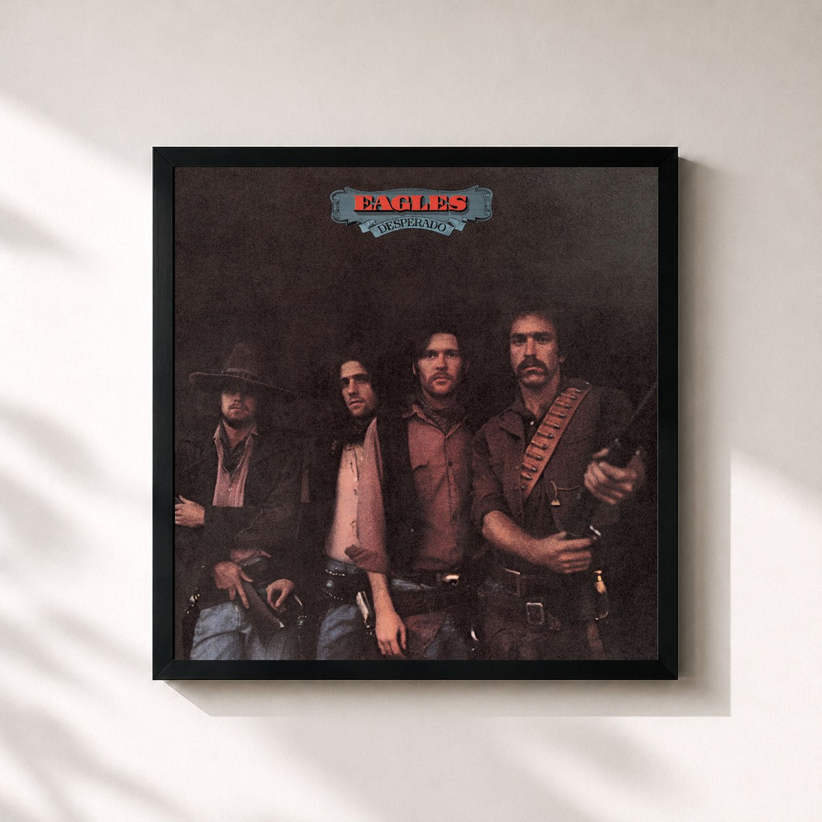 #noir Desperado (2013 Remaster) de Eagles en lámina cuadrada enmarcada, marco negro de 32x32 cm