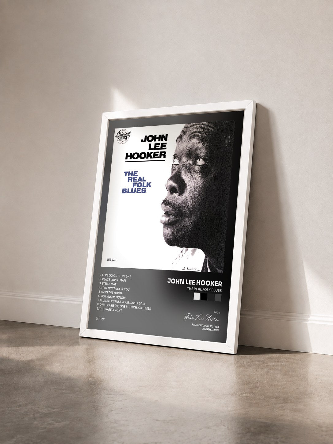 #blanc The Real Folk Blues de John Lee Hooker en lámina enmarcada vista de tres cuartos, marco blanco