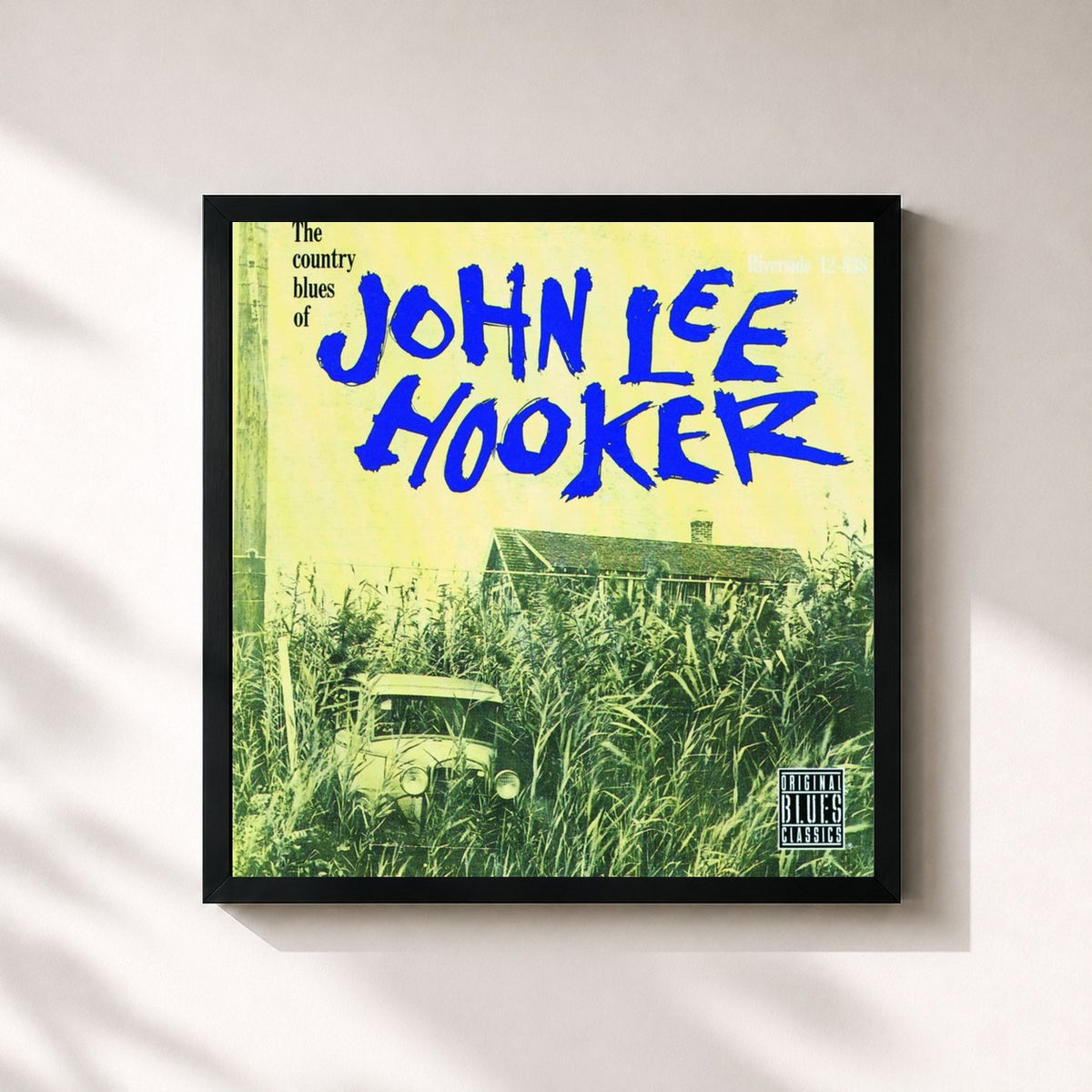 #noir The Country Blues Of John Lee Hooker de John Lee Hooker en lámina cuadrada enmarcada, marco negro de 32x32 cm