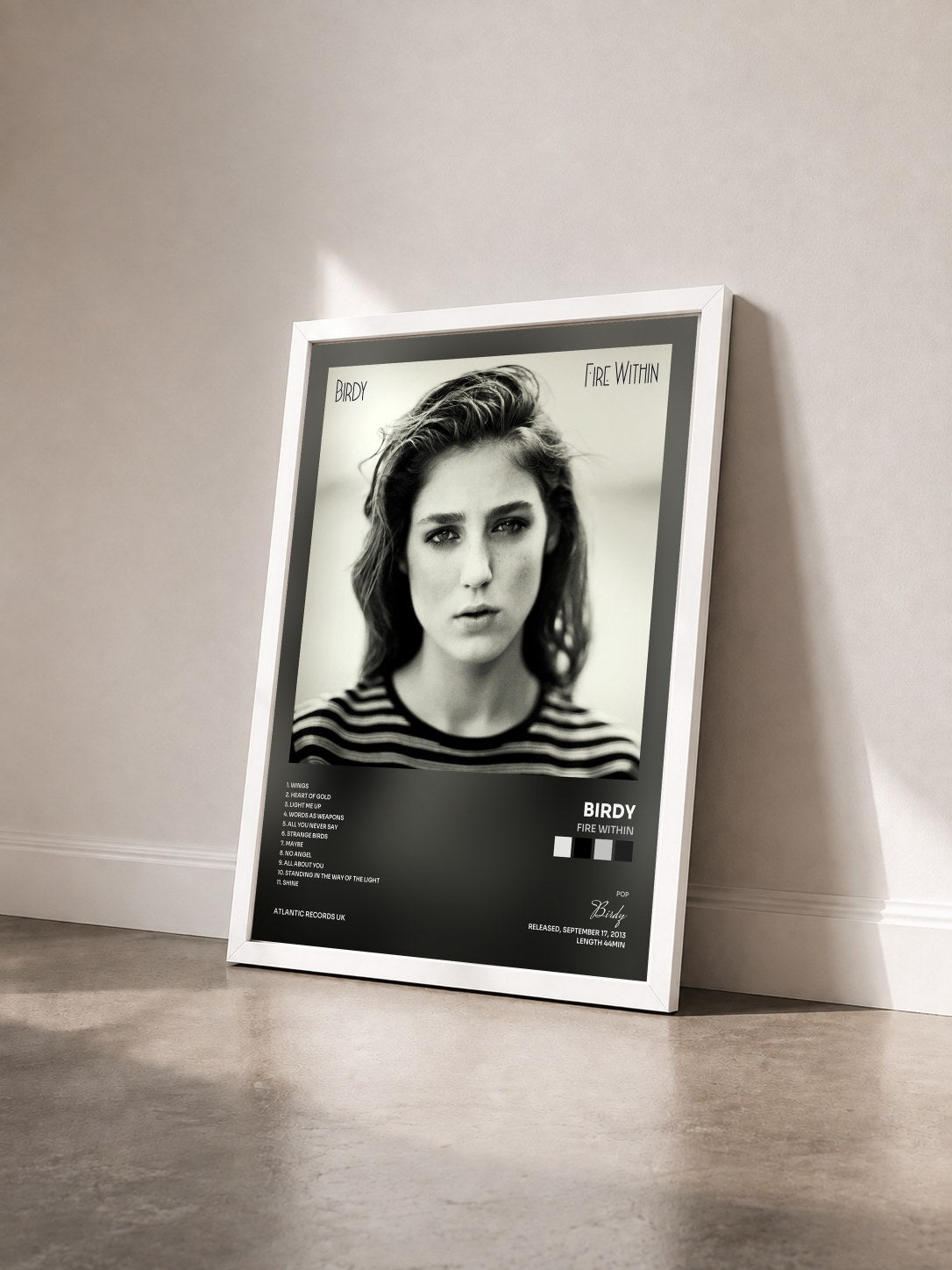 #blanc Tableau de l'album Fire Within de Birdy vu de trois quarts, cadre blanc