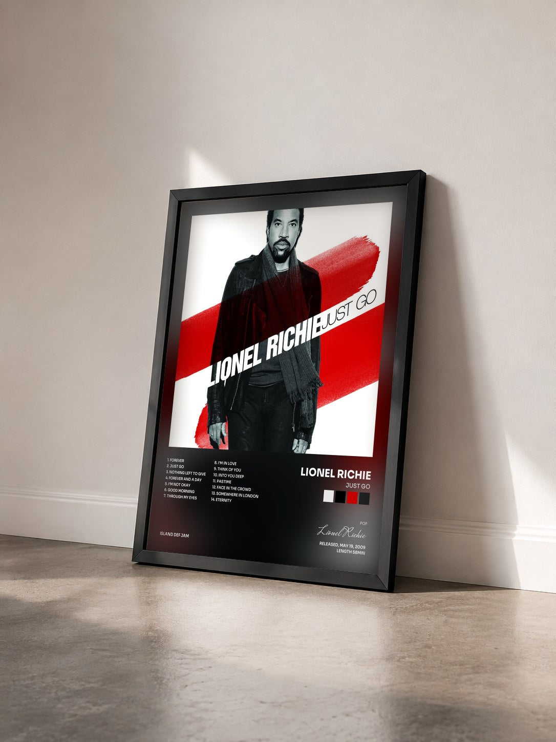 #noir Tableau de l'album Just Go de Lionel Richie vu de trois quarts, cadre noir