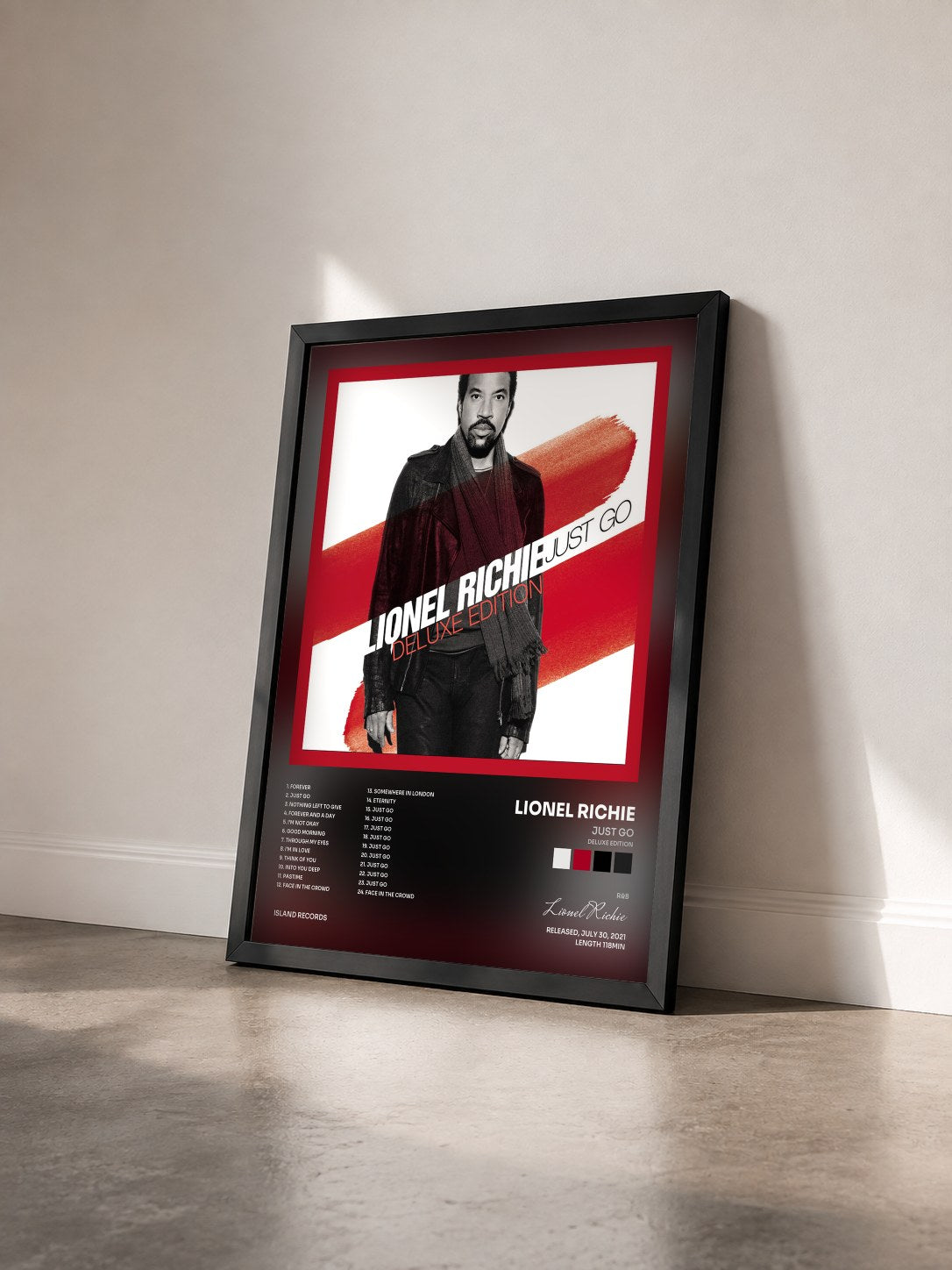 #noir Tableau de l'album Just Go (Deluxe Edition) de Lionel Richie vu de trois quarts, cadre noir