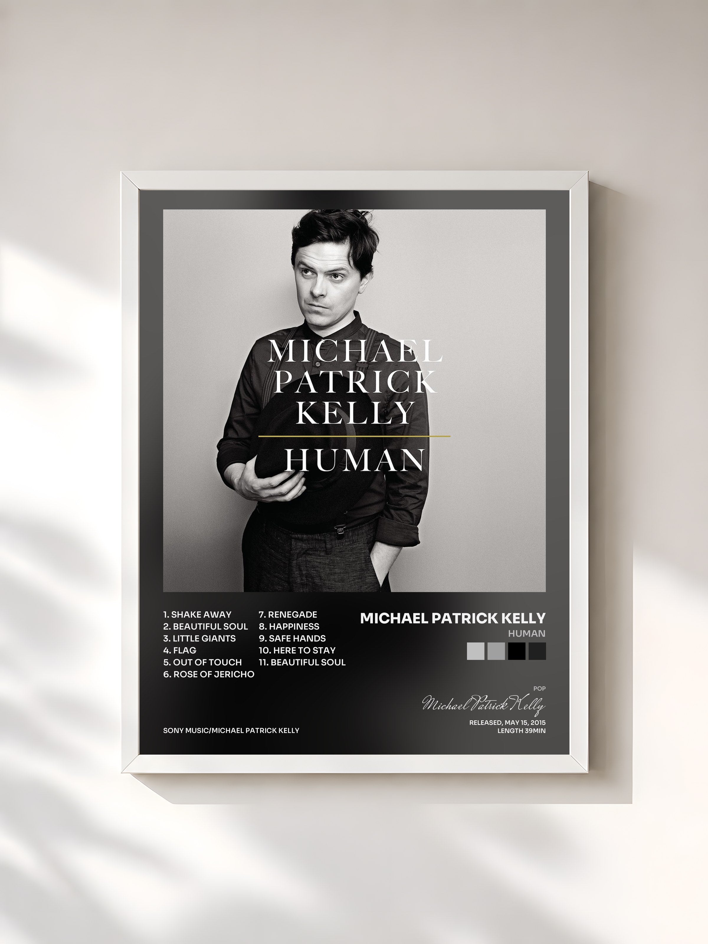 #blanc Tableau de l'album Human de Michael Patrick Kelly, cadre blanc, imprimé et encadré en France