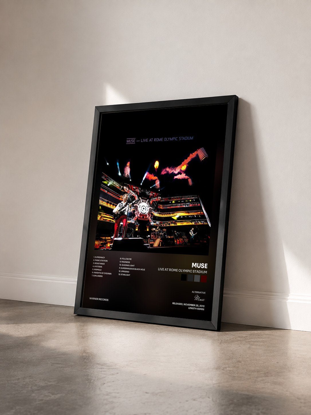 #noir Tableau de l'album Live at Rome Olympic Stadium de Muse vu de trois quarts, cadre noir