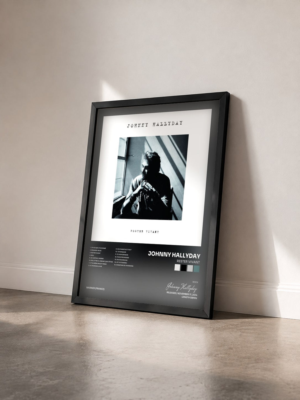 #noir Rester vivant by Johnny Hallyday as a framed art print seen at an angle, black frame