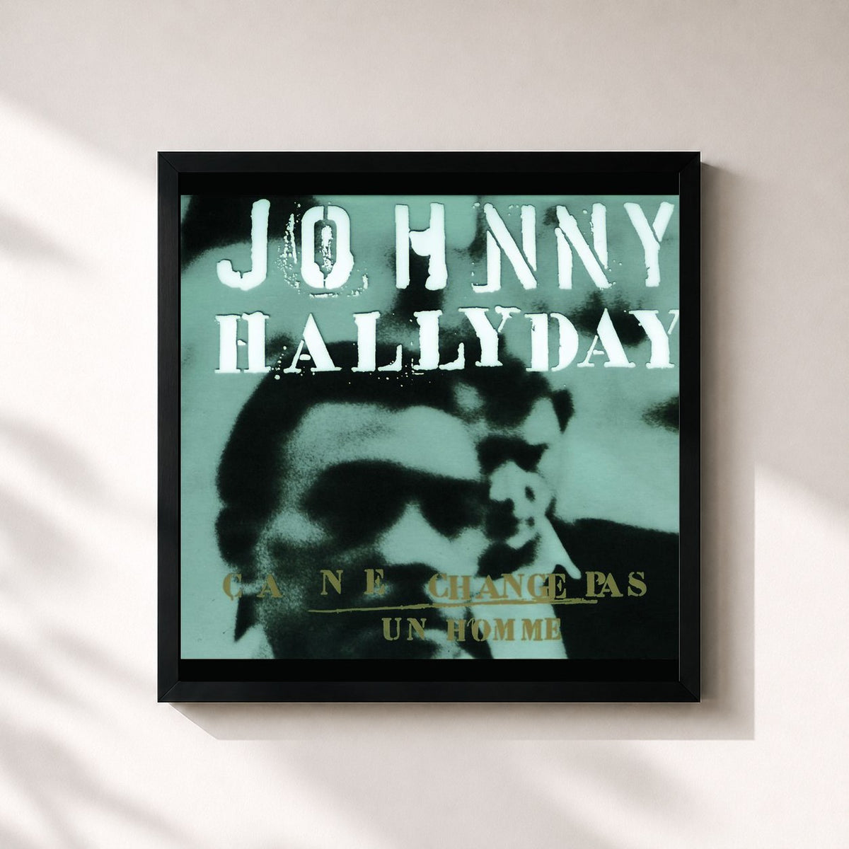 #noir Ça ne change pas un homme di Johnny Hallyday in stampa quadrata incorniciata, cornice nera 32x32 cm