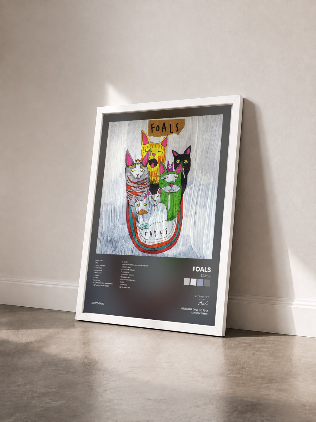 #blanc Tapes by Foals as a framed art print seen at an angle, white frame