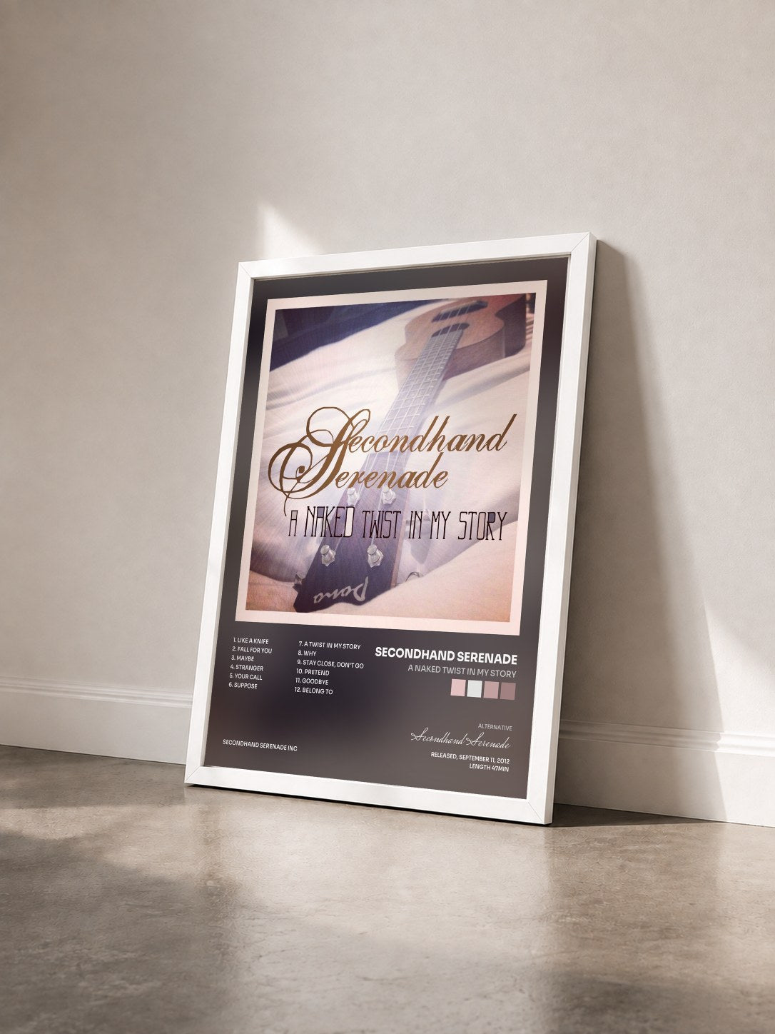 #blanc Tableau de l'album A Naked Twist in My Story de Secondhand Serenade vu de trois quarts, cadre blanc
