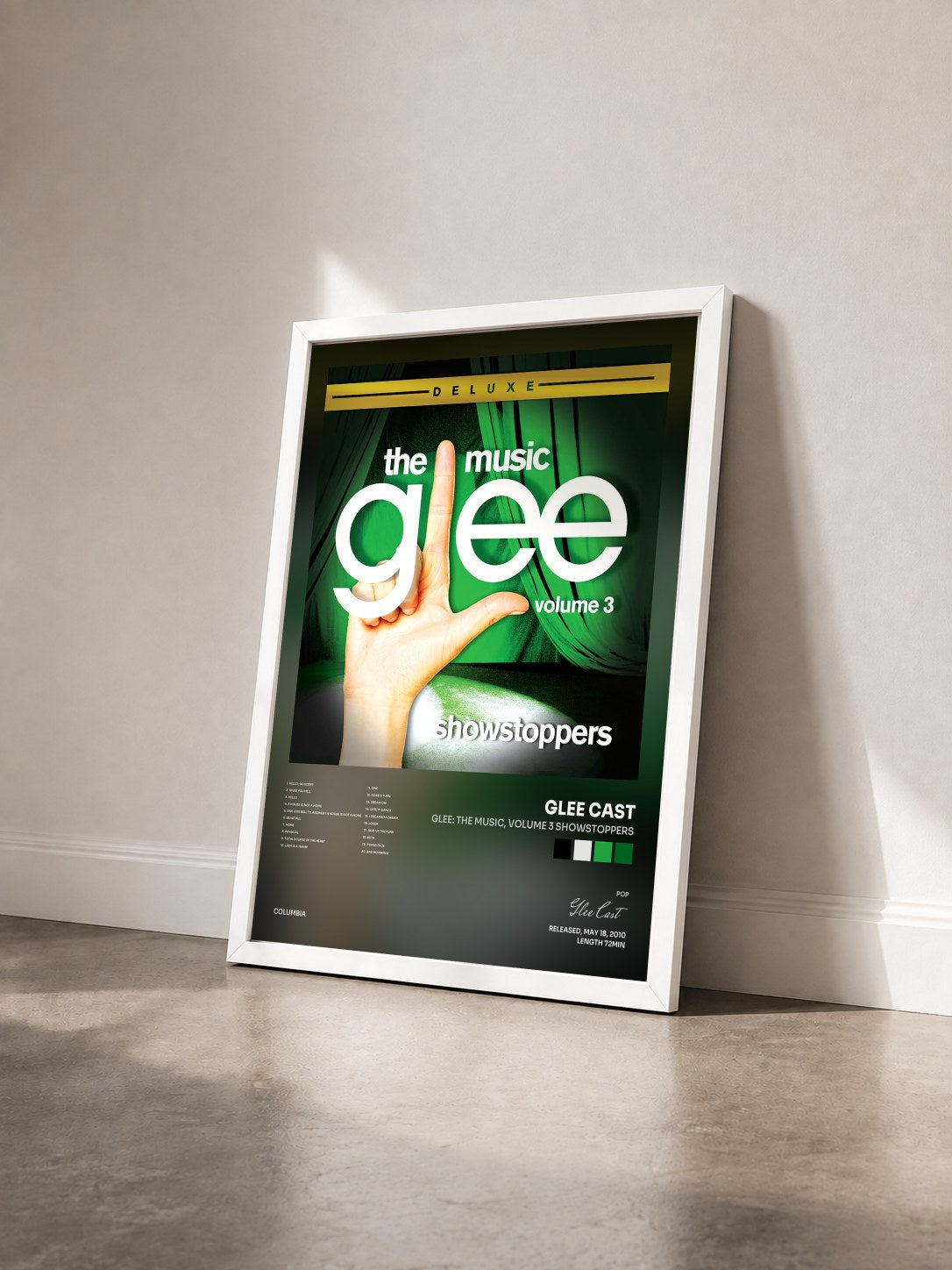 #blanc Tableau de l'album Glee: The Music, Volume 3 Showstoppers de Glee Cast vu de trois quarts, cadre blanc
