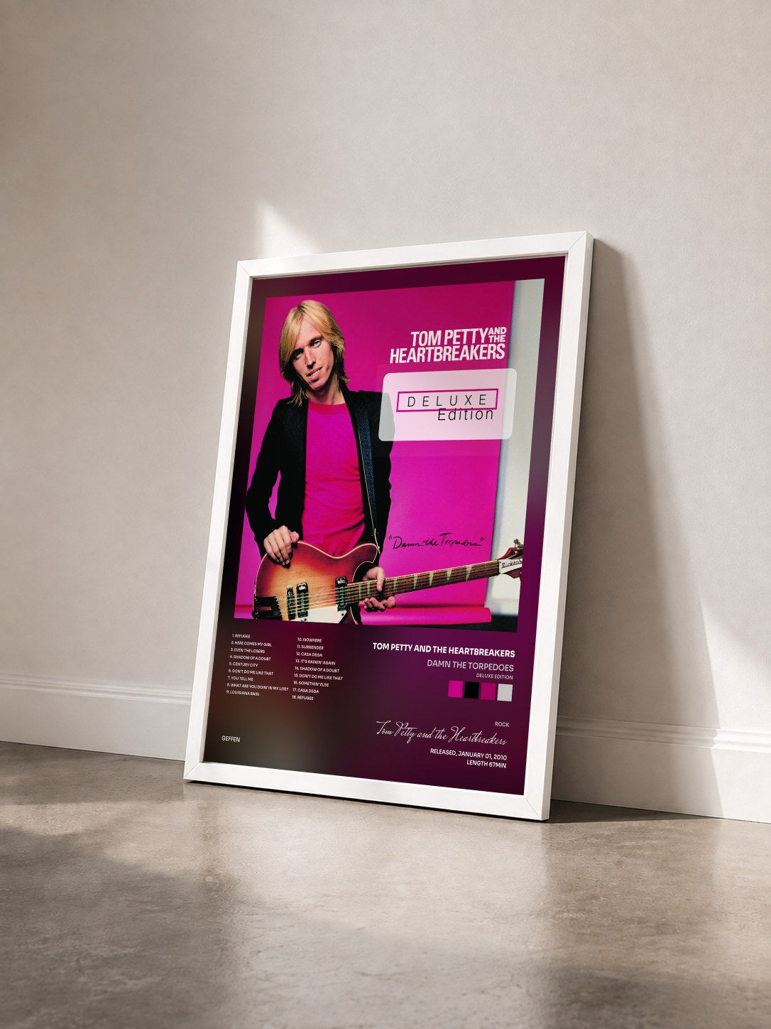 #blanc Tableau de l'album Damn The Torpedoes (Deluxe Edition) de Tom Petty and the Heartbreakers vu de trois quarts, cadre blanc