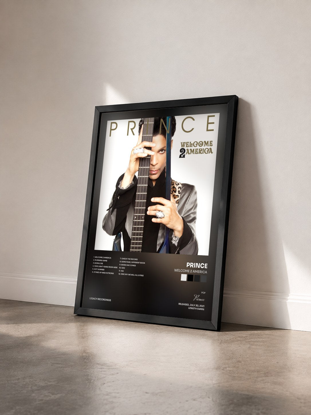 #noir Tableau de l'album Welcome 2 America de Prince vu de trois quarts, cadre noir