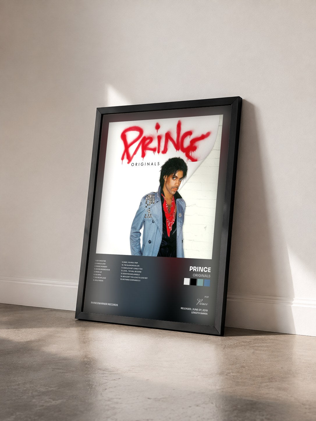 #noir Tableau de l'album Originals de Prince vu de trois quarts, cadre noir