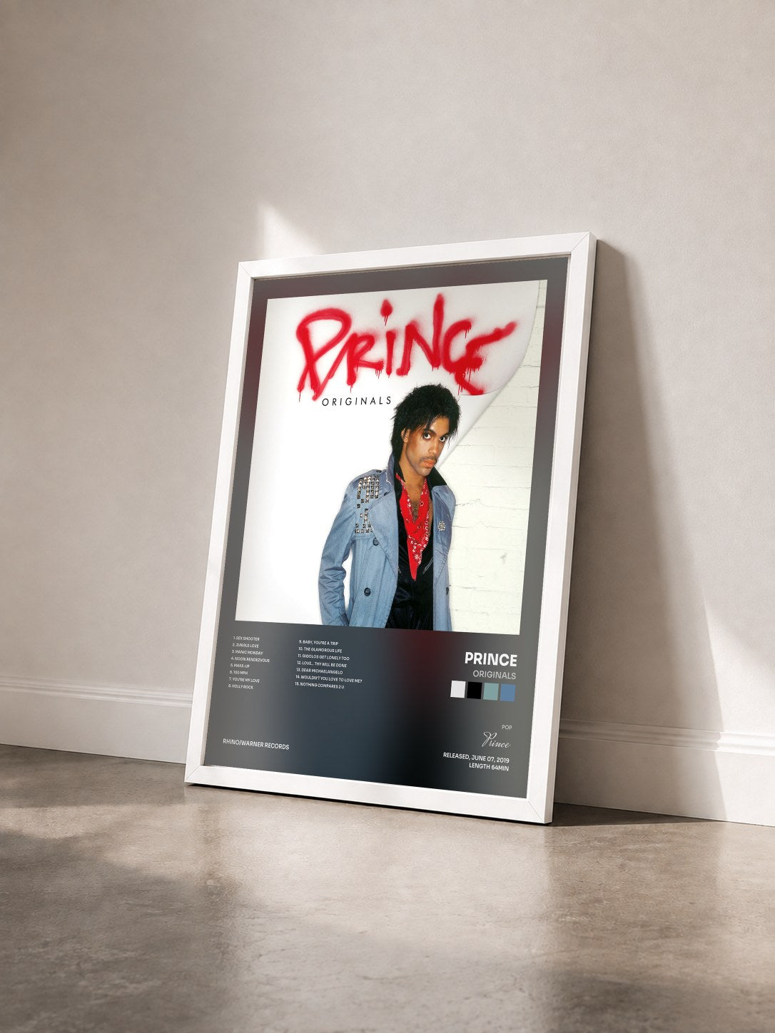 #blanc Tableau de l'album Originals de Prince vu de trois quarts, cadre blanc