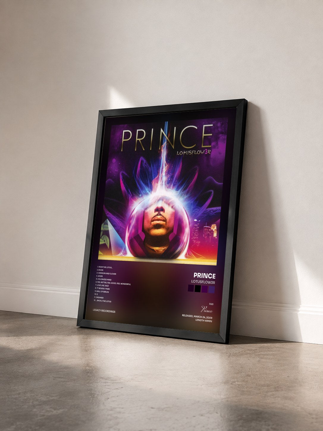 #noir Tableau de l'album LOtUSFLOW3R de Prince vu de trois quarts, cadre noir