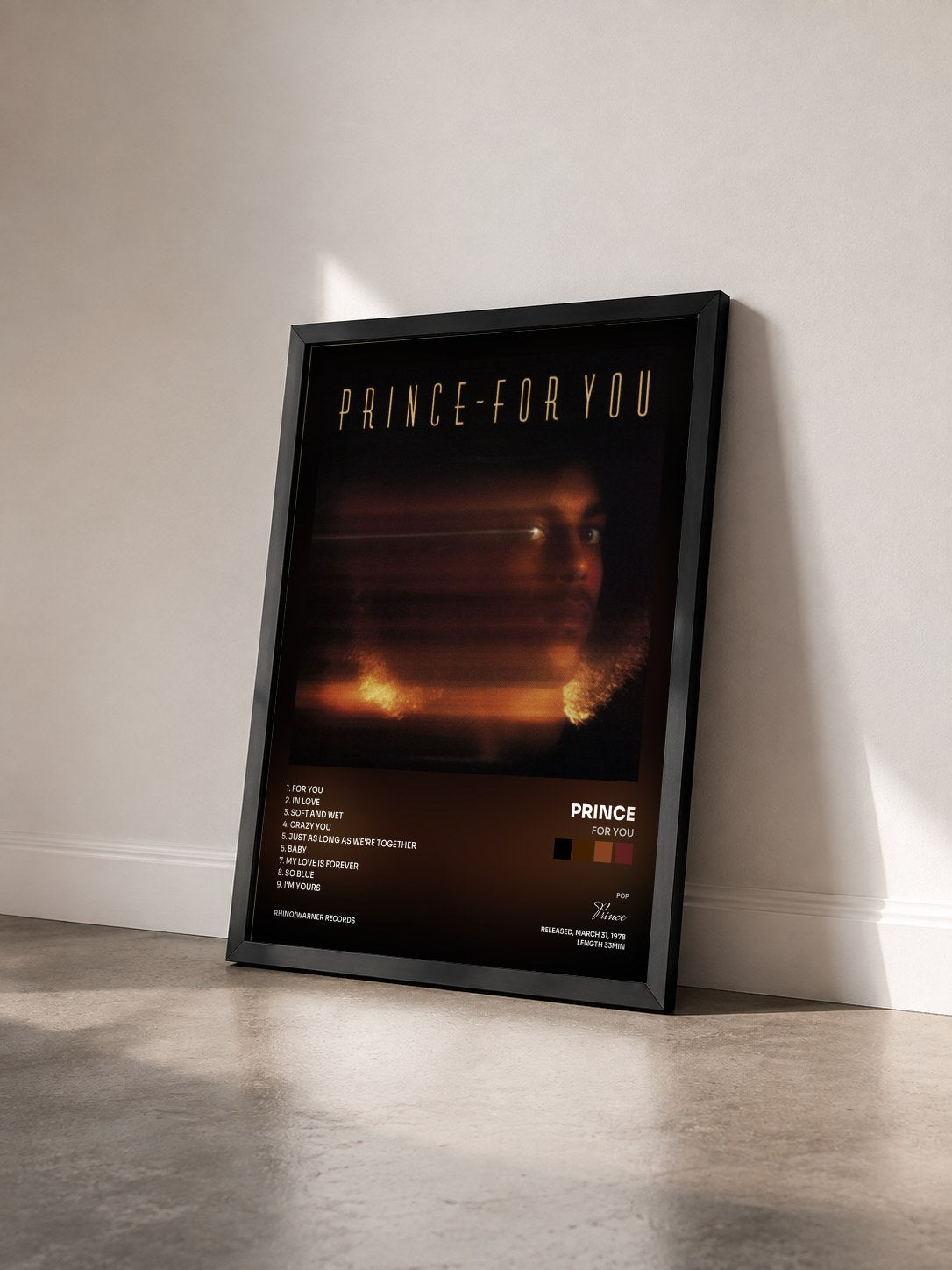 #noir Tableau de l'album For You de Prince vu de trois quarts, cadre noir