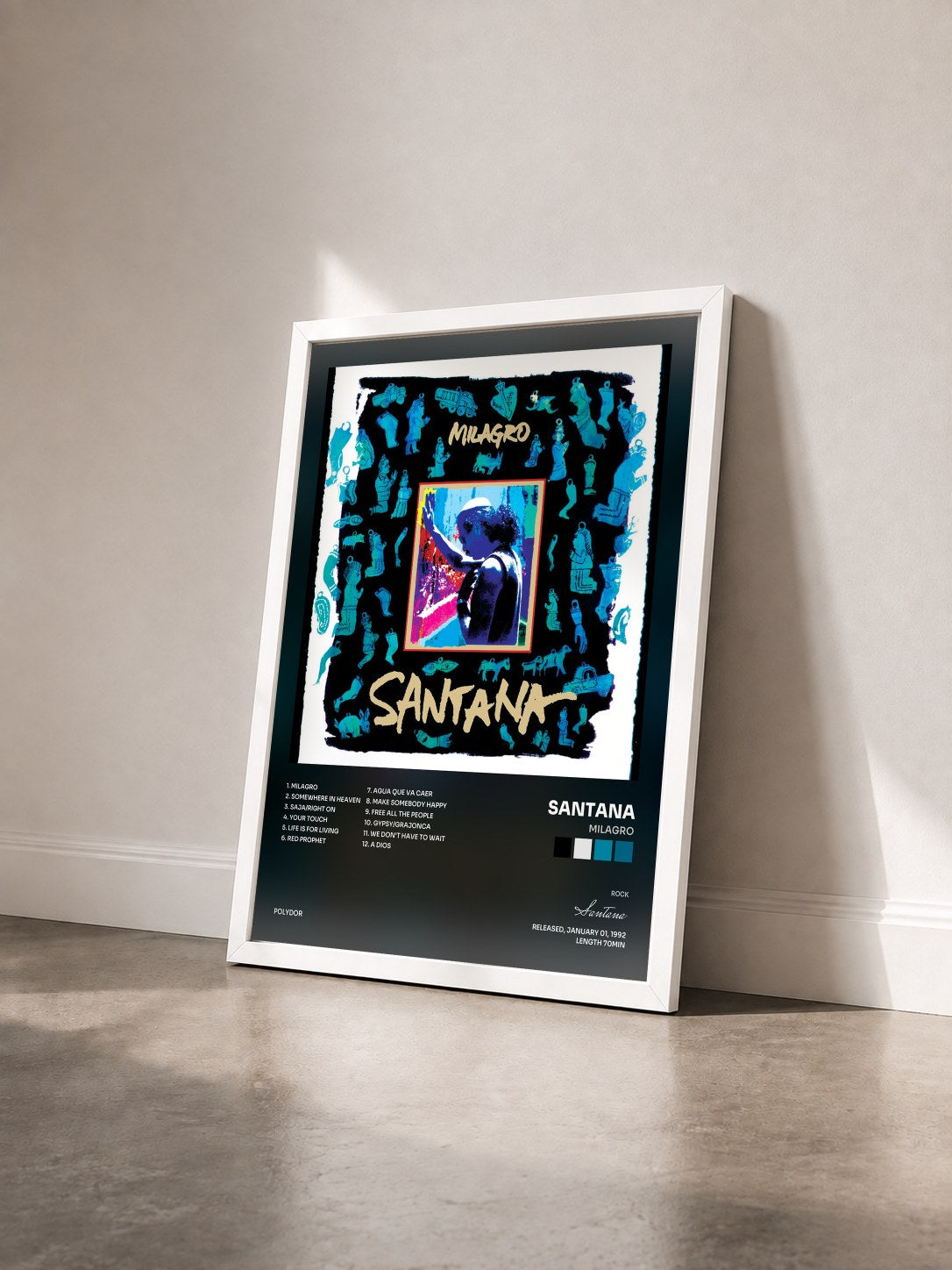 #blanc Tableau de l'album Milagro de Santana vu de trois quarts, cadre blanc