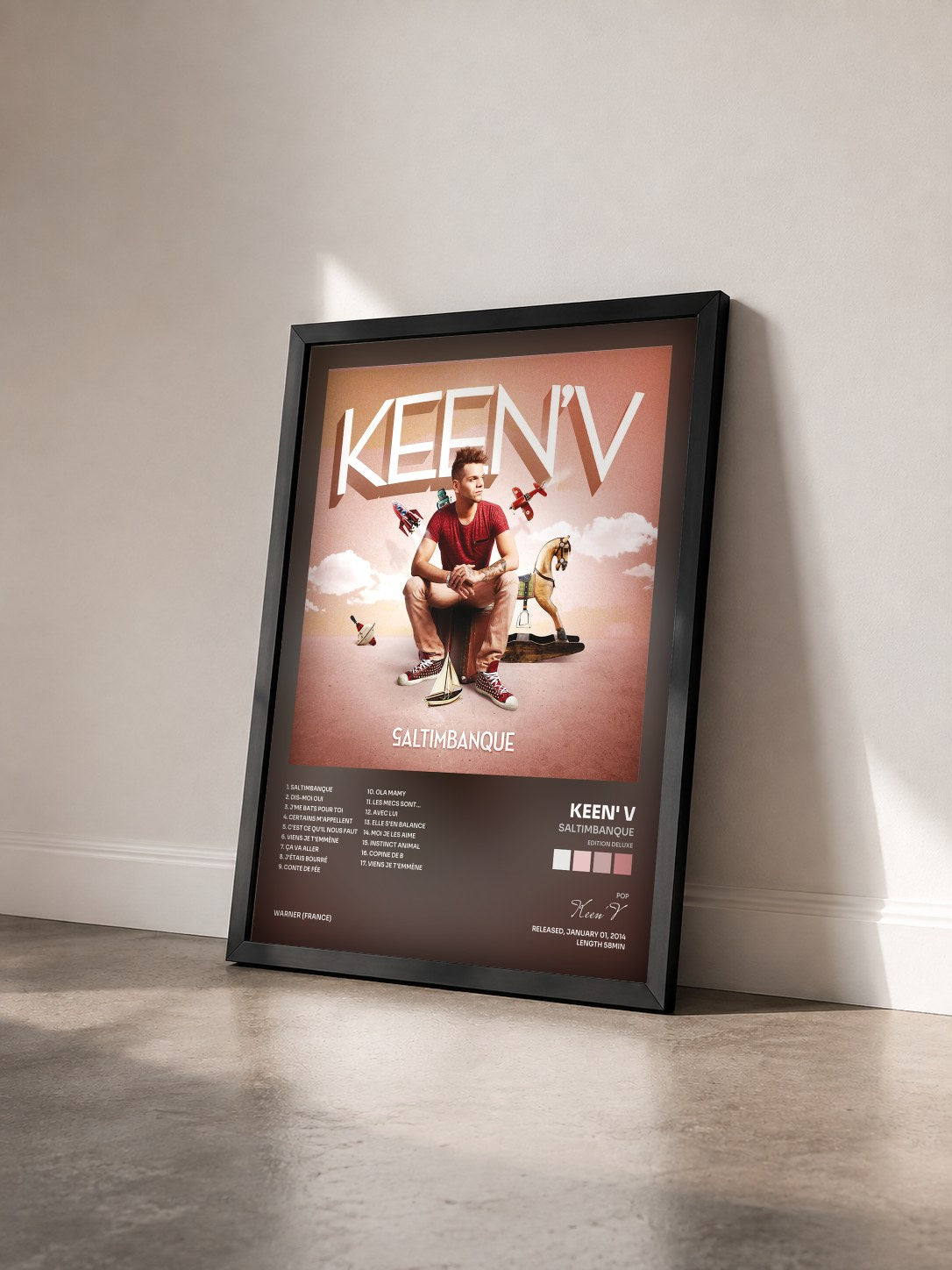 #noir Tableau de l'album Saltimbanque (Edition Deluxe) de Keen' V vu de trois quarts, cadre noir