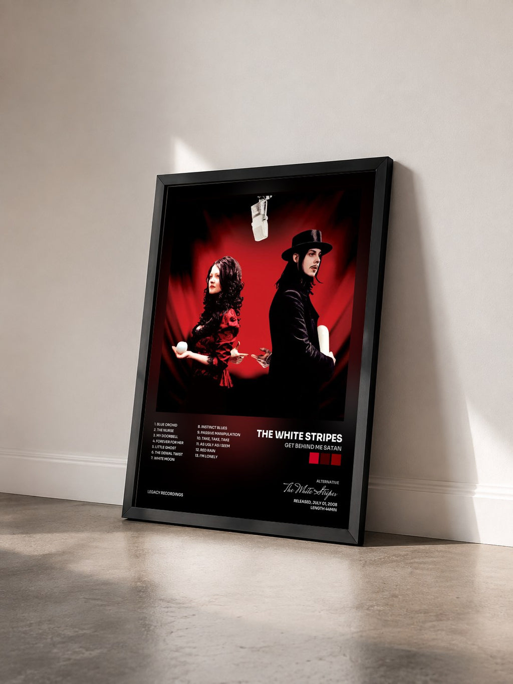 #noir Tableau de l'album Get Behind Me Satan de The White Stripes vu de trois quarts, cadre noir