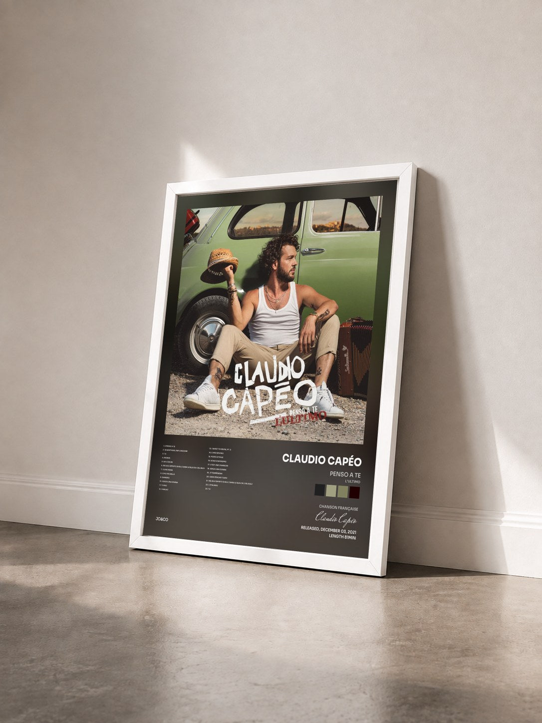 #blanc Tableau de l'album Penso a te (L'ultimo) de Claudio Capéo vu de trois quarts, cadre blanc