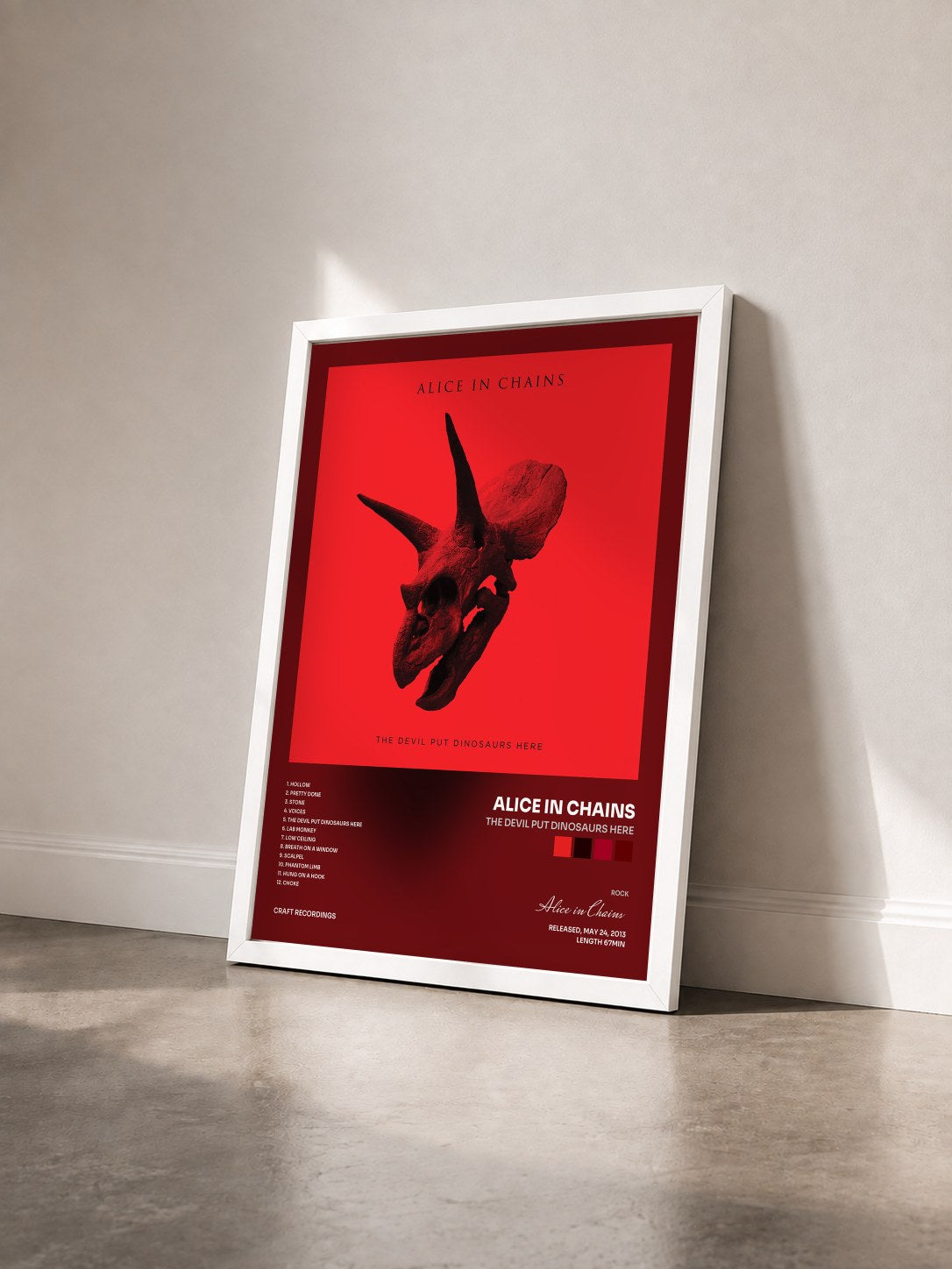 #blanc Tableau de l'album The Devil Put Dinosaurs Here de Alice in Chains vu de trois quarts, cadre blanc