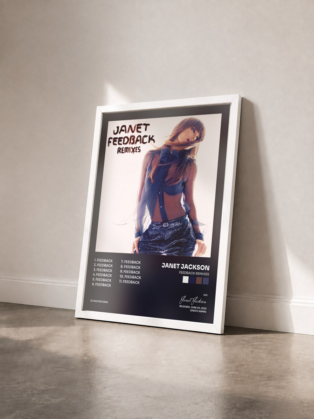 #blanc Tableau de l'album Feedback Remixes de Janet Jackson vu de trois quarts, cadre blanc