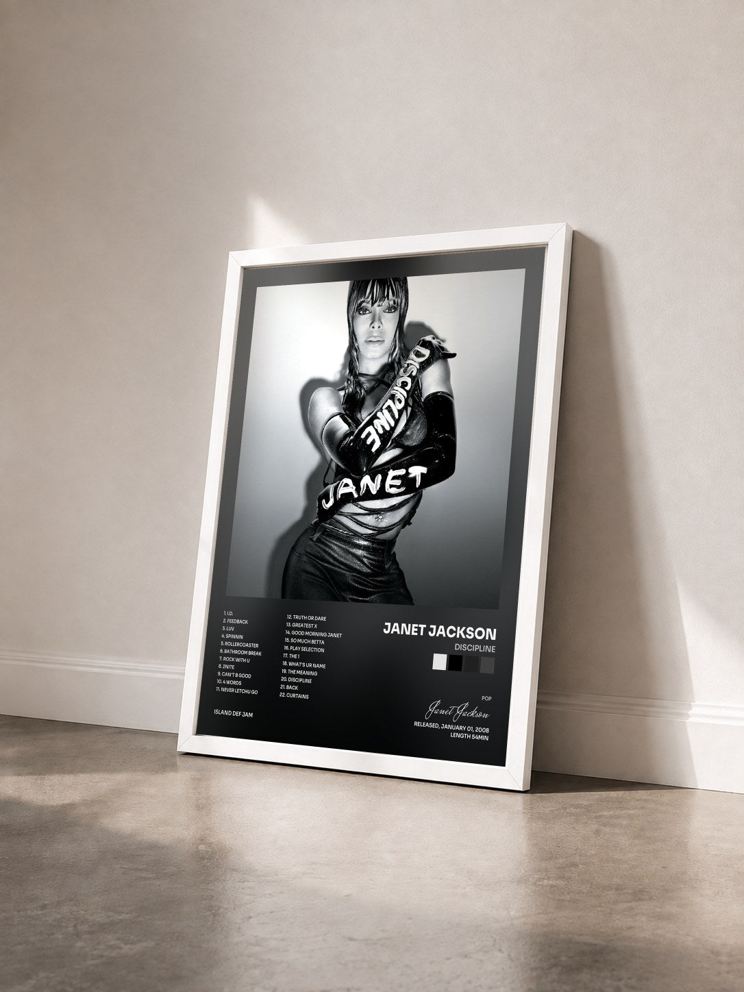 #blanc Tableau de l'album Discipline de Janet Jackson vu de trois quarts, cadre blanc