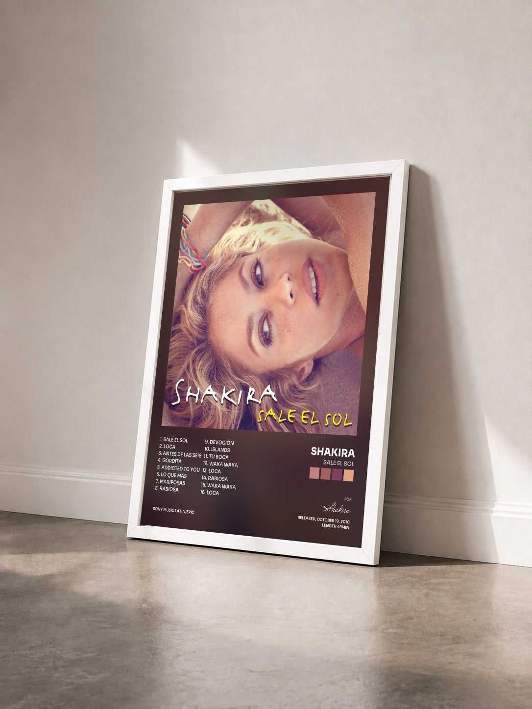 #blanc Tableau de l'album Sale el Sol de Shakira vu de trois quarts, cadre blanc