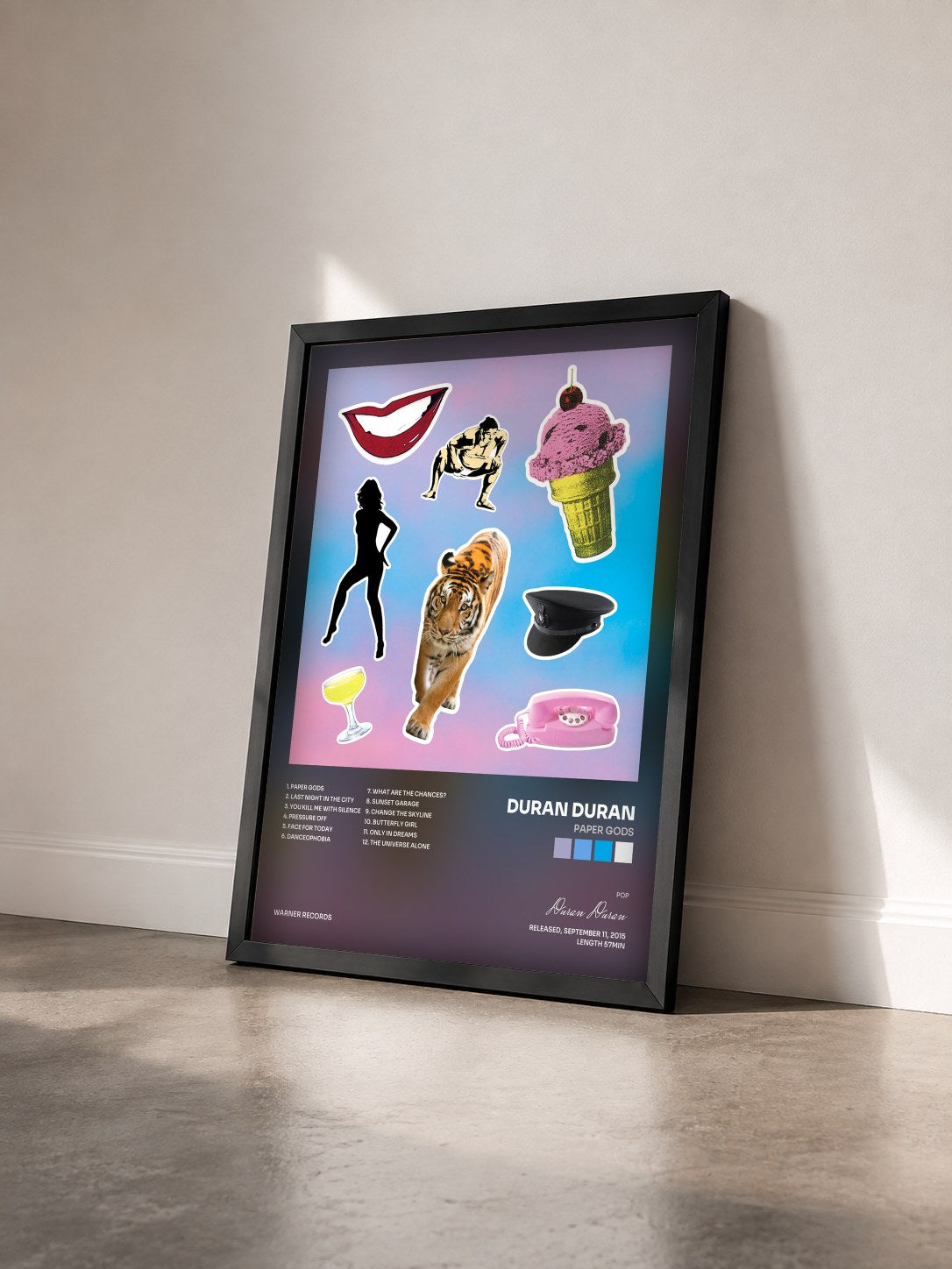 #noir Tableau de l'album Paper Gods de Duran Duran vu de trois quarts, cadre noir