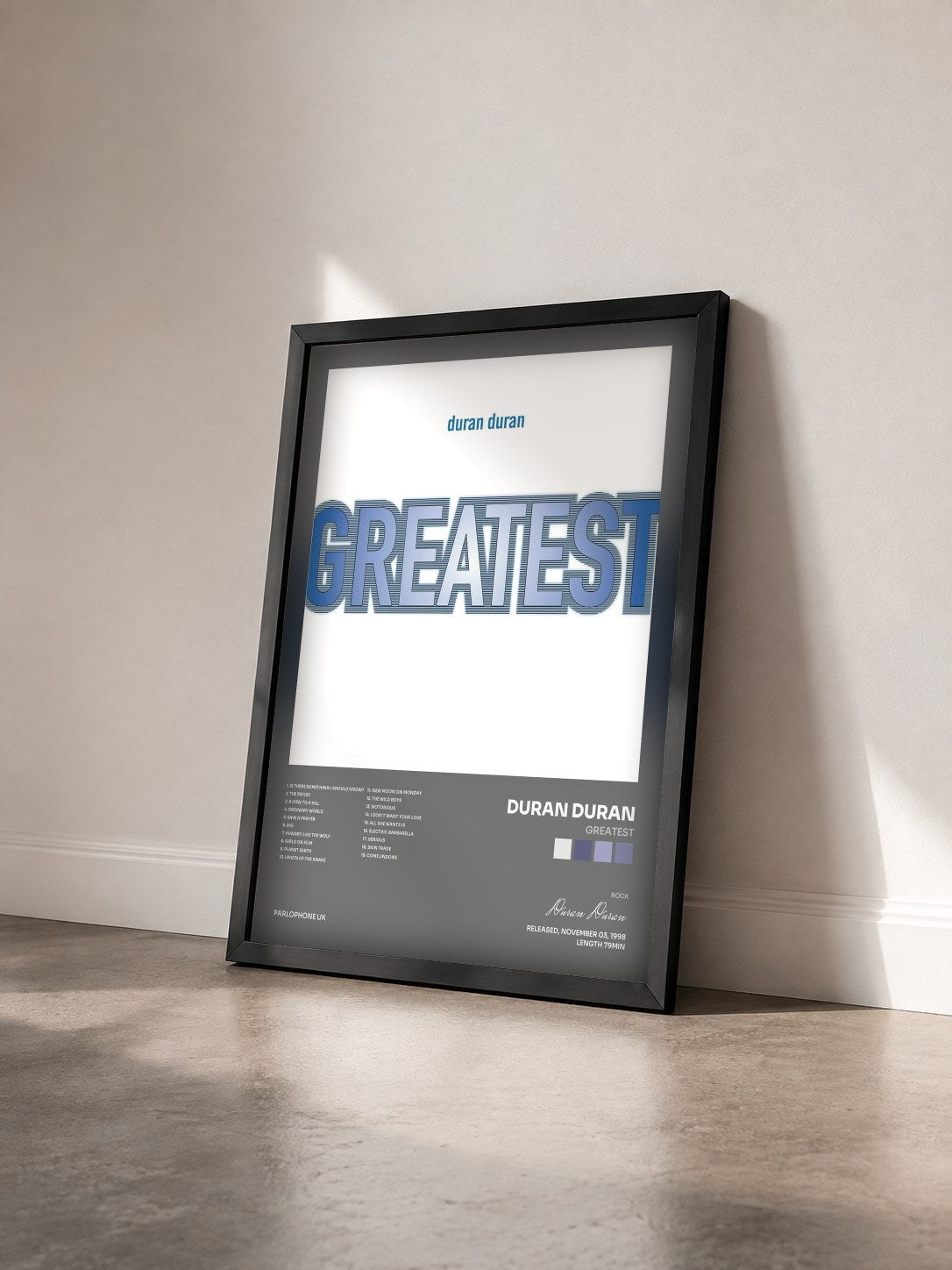 #noir Greatest by Duran Duran as a framed art print seen at an angle, black frame