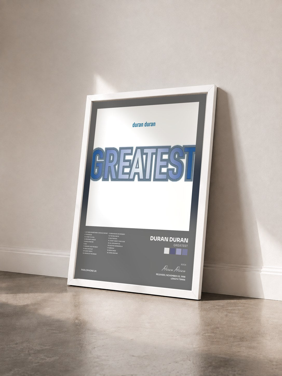 #blanc Greatest by Duran Duran as a framed art print seen at an angle, white frame