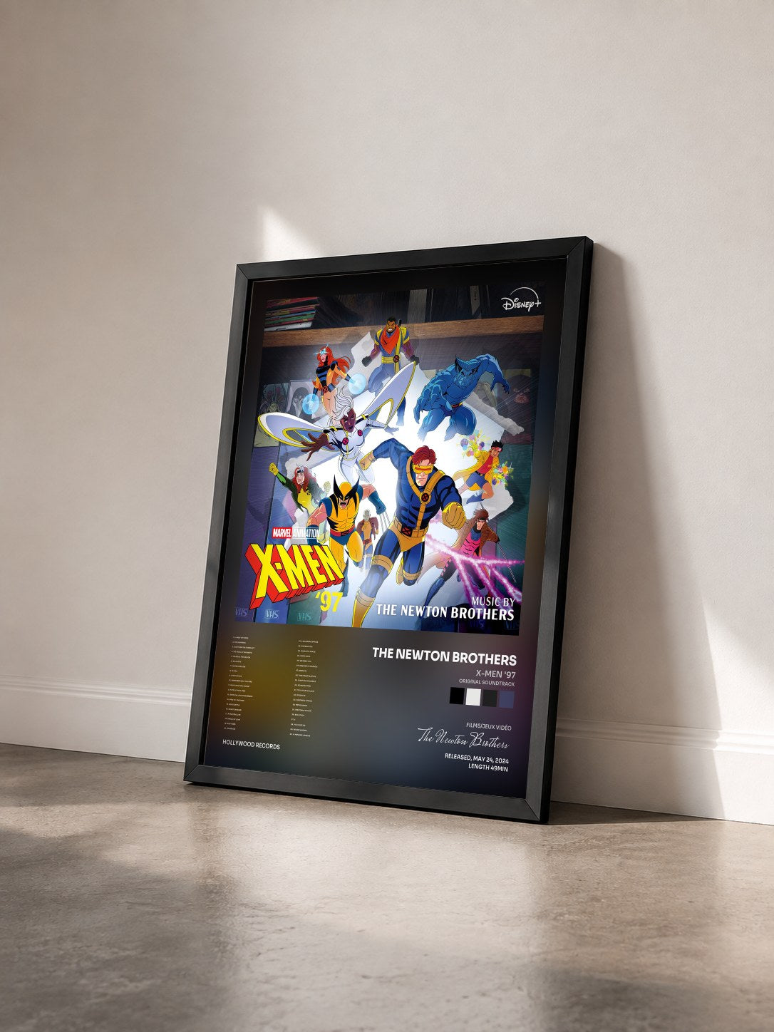 #noir Tableau de l'album X-Men '97 (Original Soundtrack) de The Newton Brothers vu de trois quarts, cadre noir