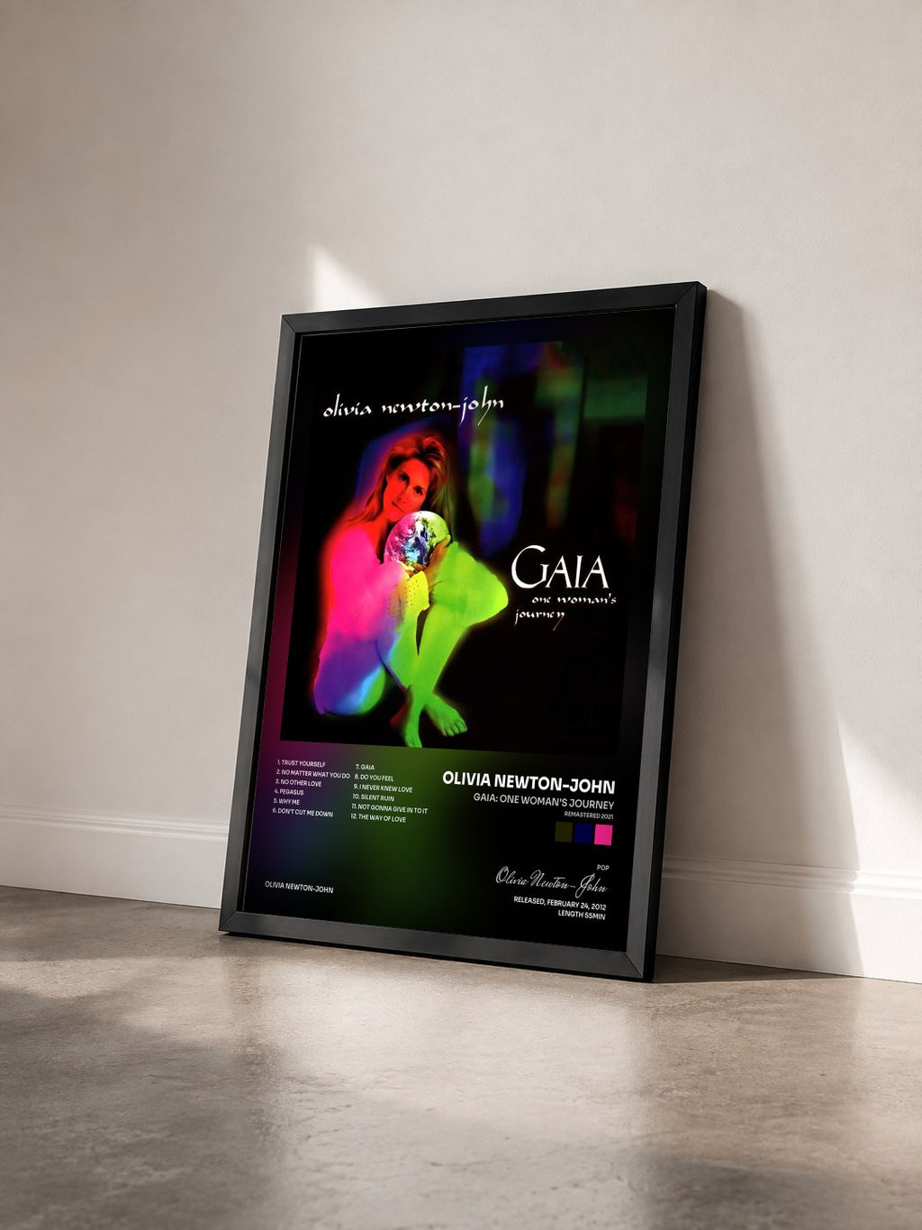 #noir Tableau de l'album Gaia: One Woman's Journey (Remastered 2021) de Olivia Newton-John vu de trois quarts, cadre noir